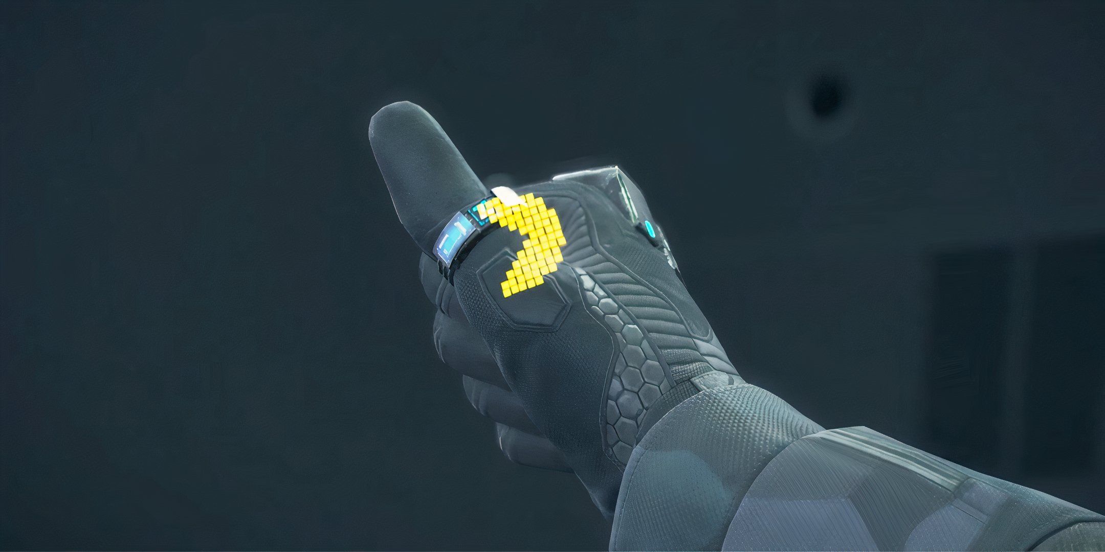 Pac-Man on Sam's thumb in Death Stranding 2: On the Beach.