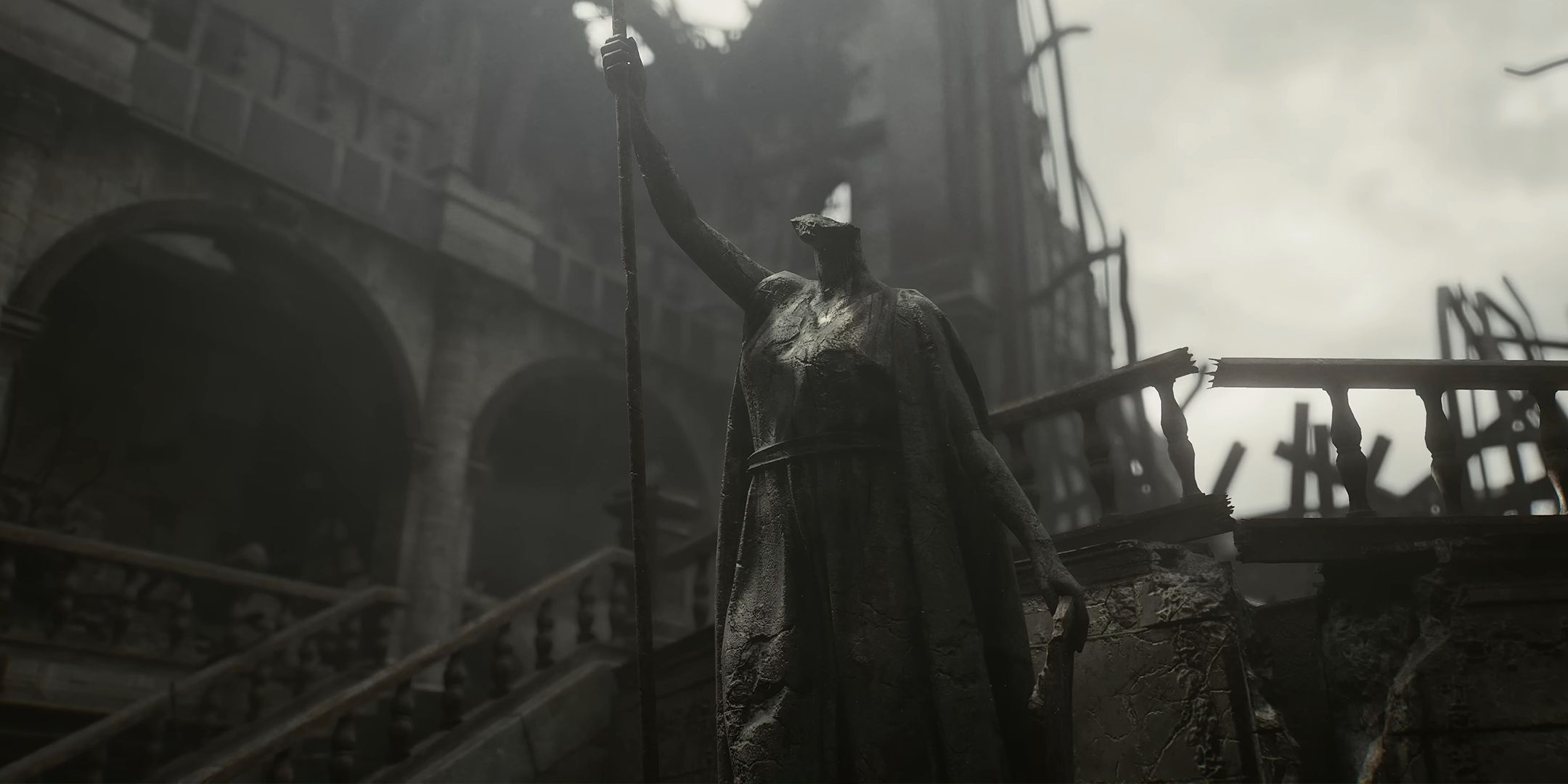 Destroyed Raccoon City police station statue in the centre of the rundown reception area from Resident Evil 9.