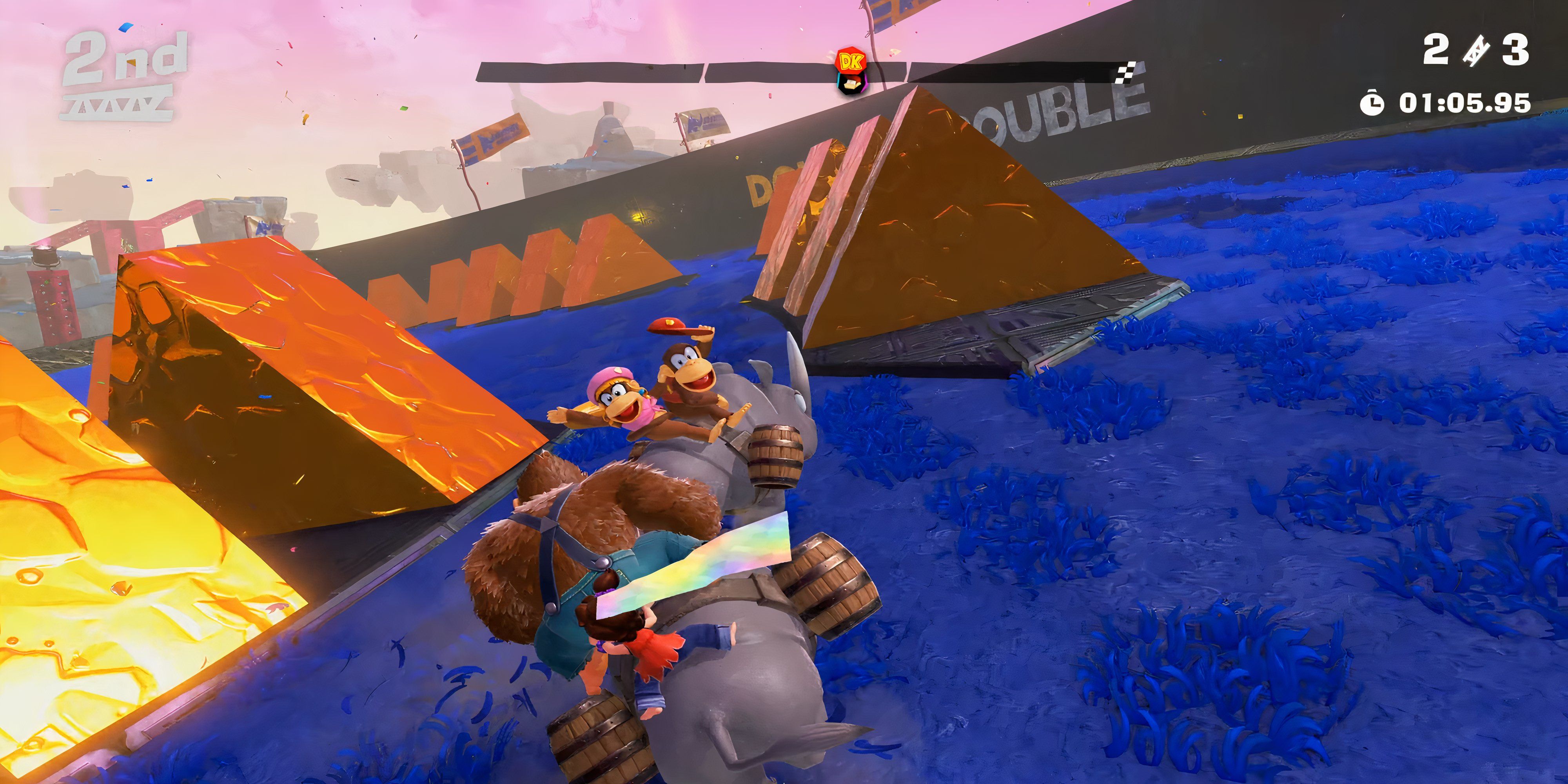 donkey kong, diddy kong, and dixie kong racing on rhinos.