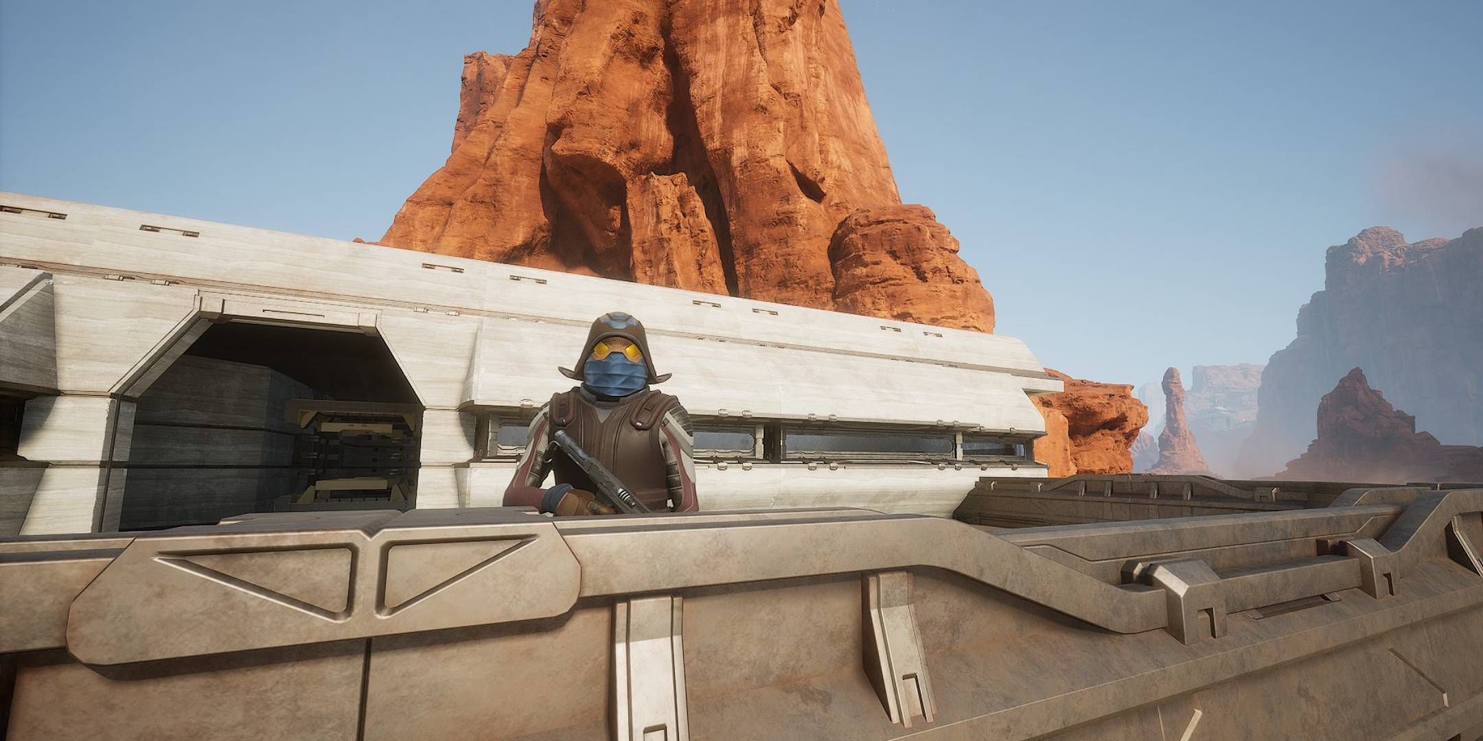 Dune_ Awakening player with a mask standing outside of their base