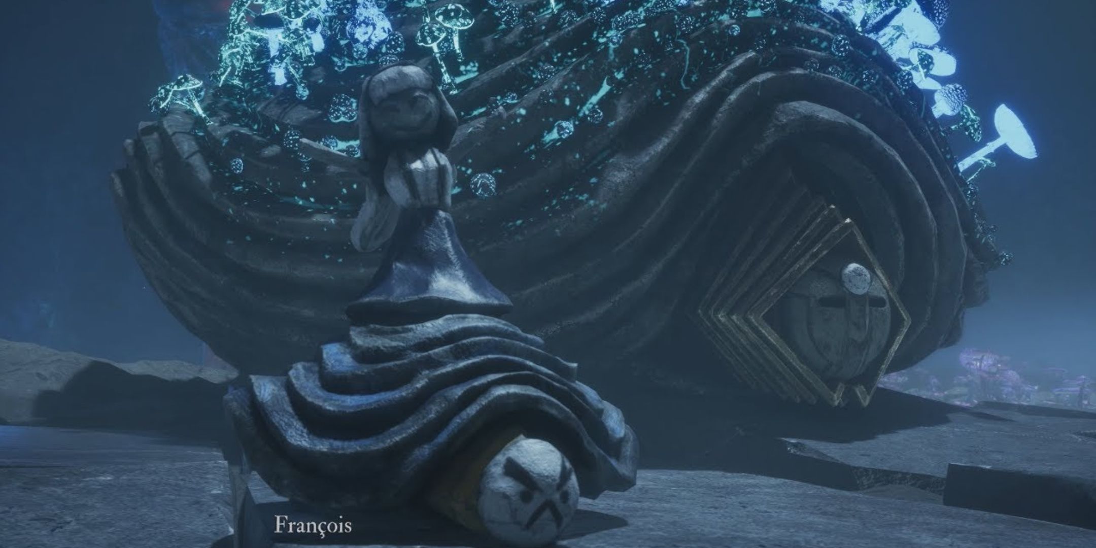 Francois next to a rock that shares his likeness in Clair Obscur Expedition 33.