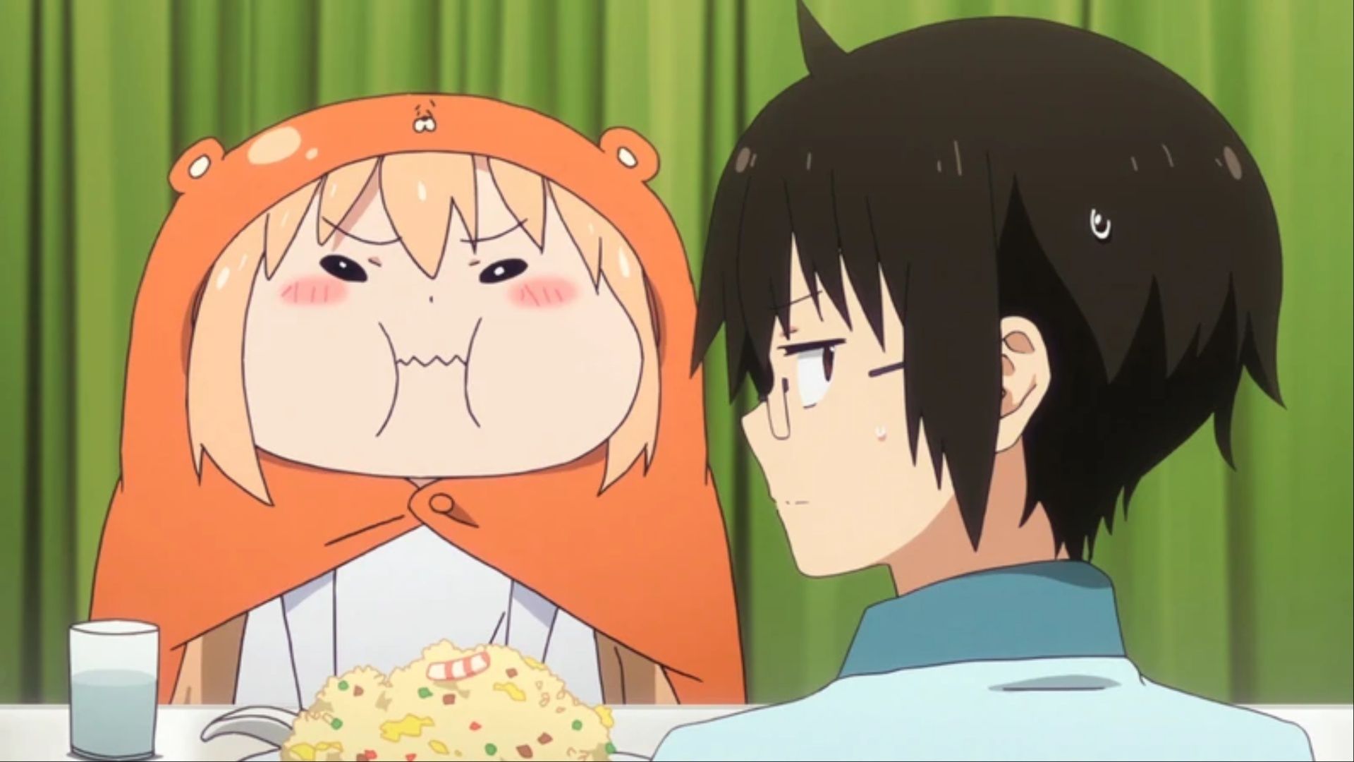 Umaru Doma looking at Taihei Doma with a look of anger as he looks away agitatedly in Himouto: Umara-chan.