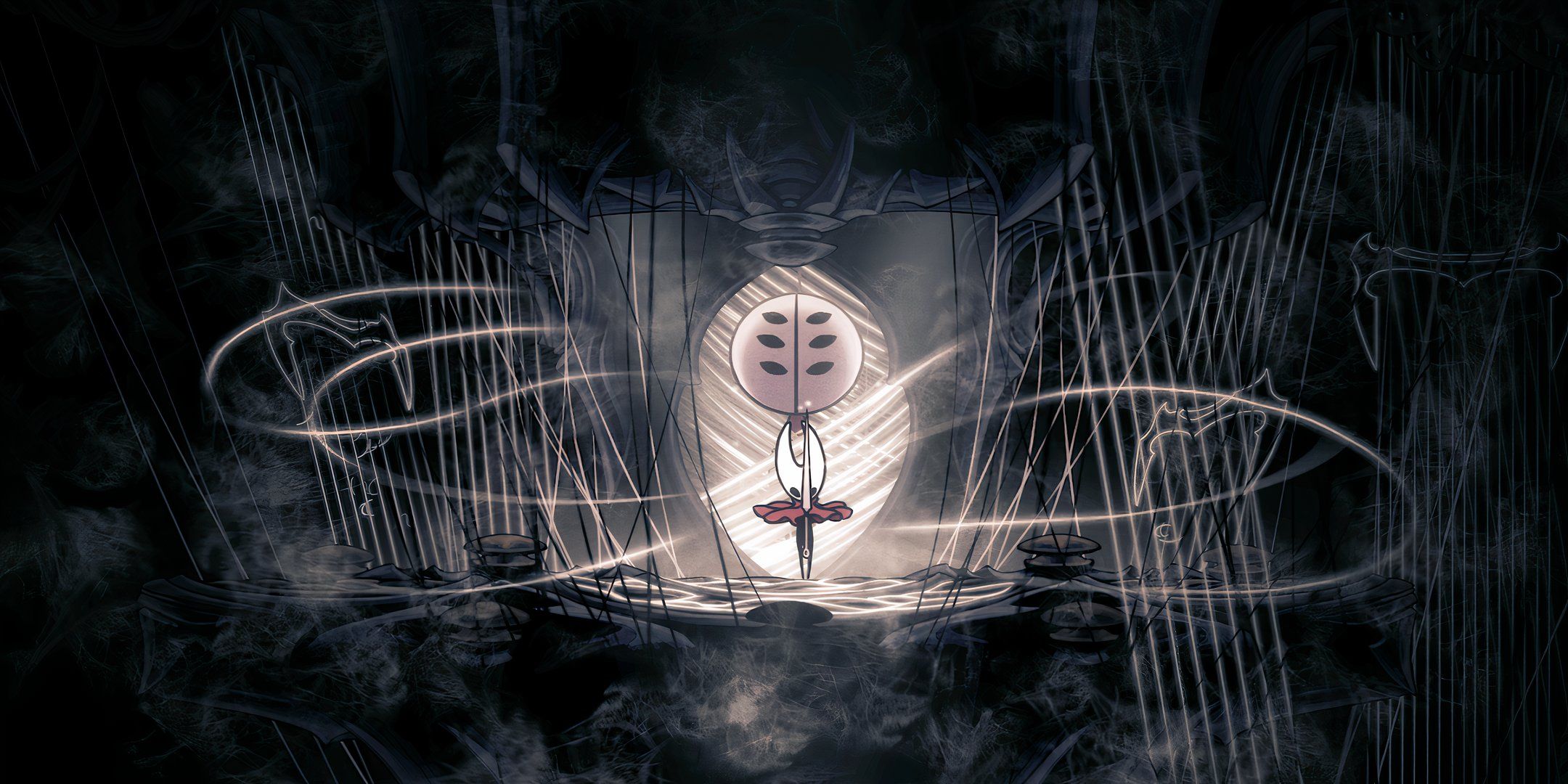 hornet holding her sword in front of her face in underground cavern.