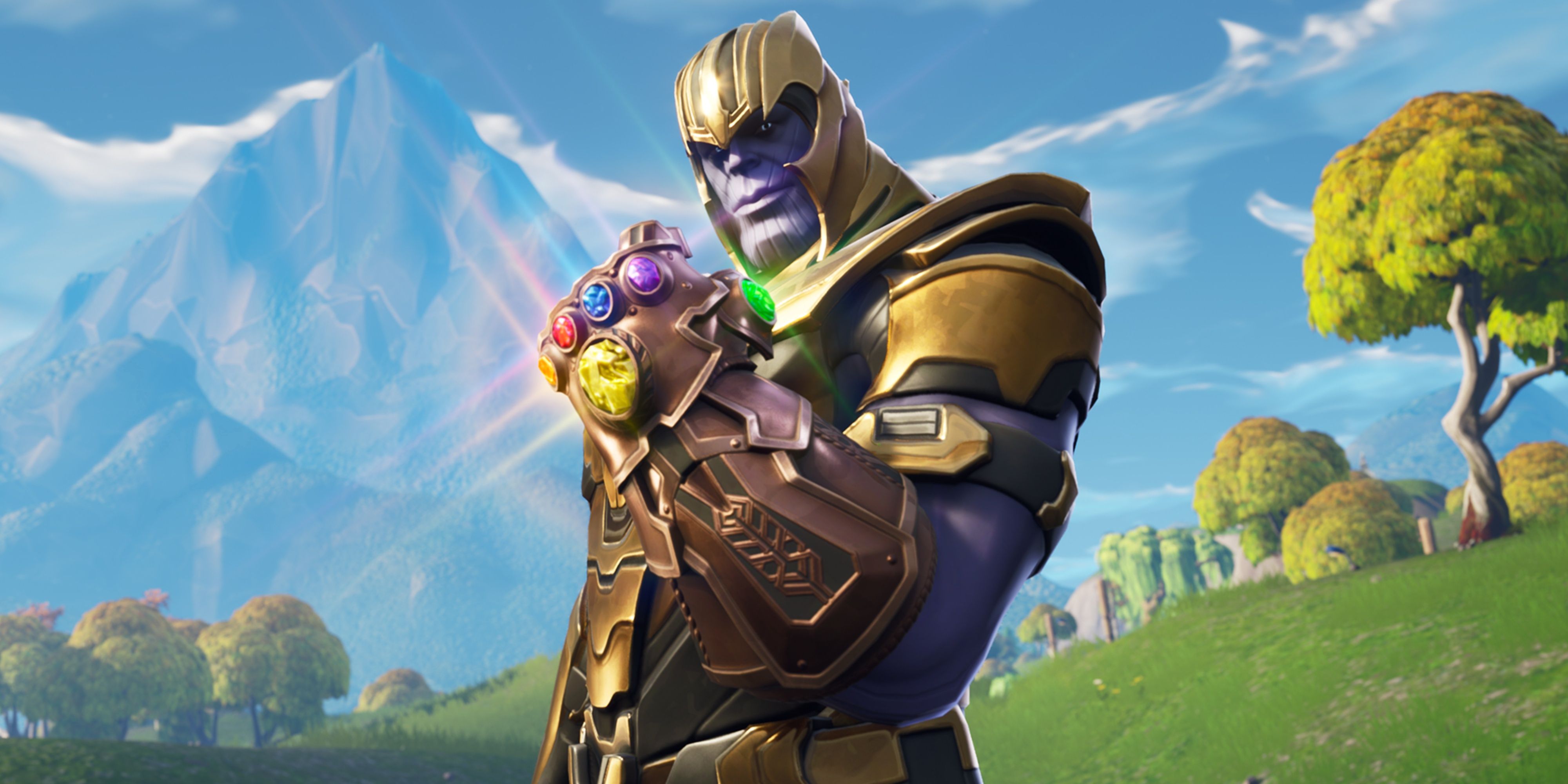 thanos wearing the infinity gauntlet in fortnite.