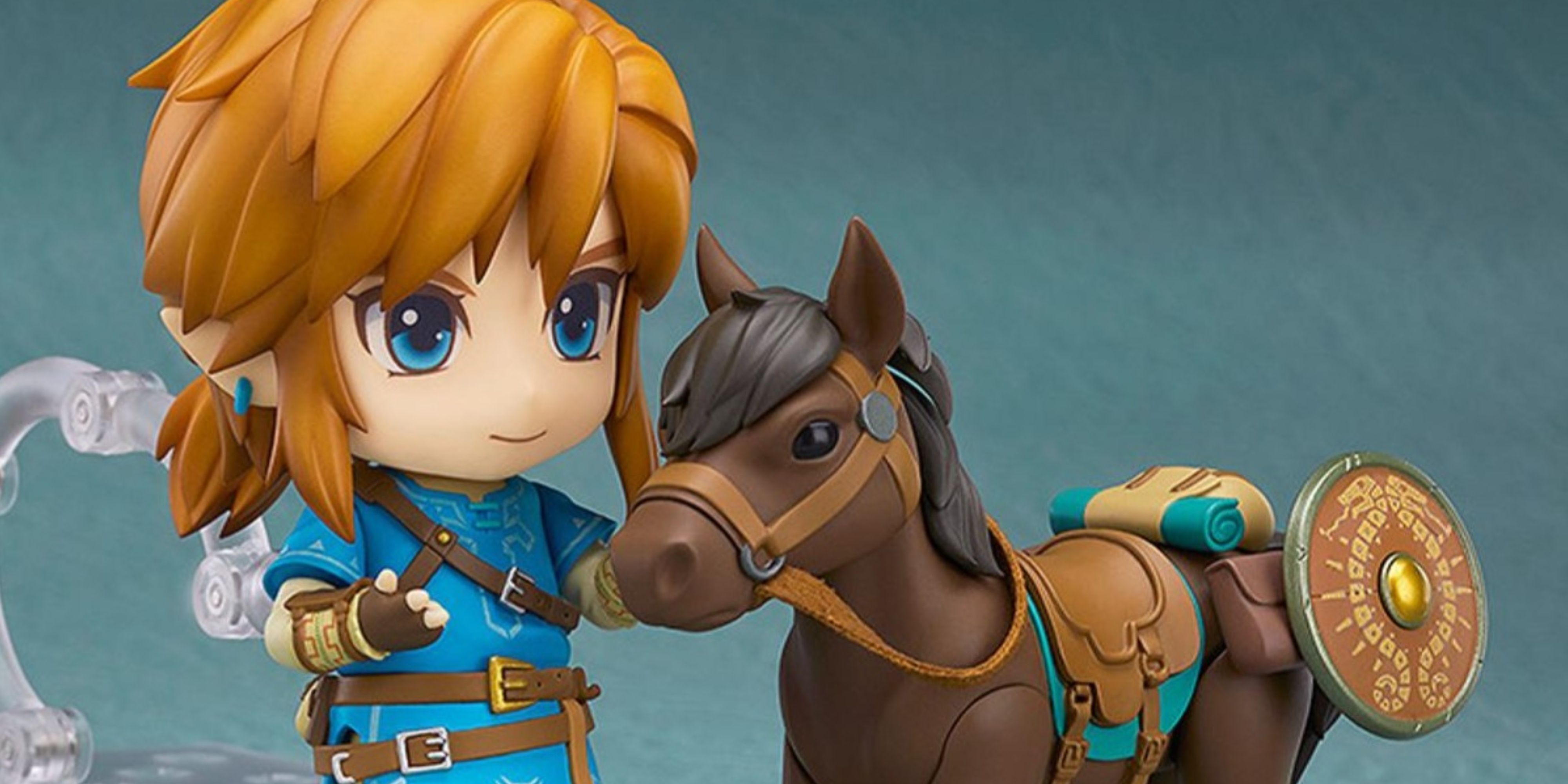 breath of the wild nendoroid link petting his horse.
