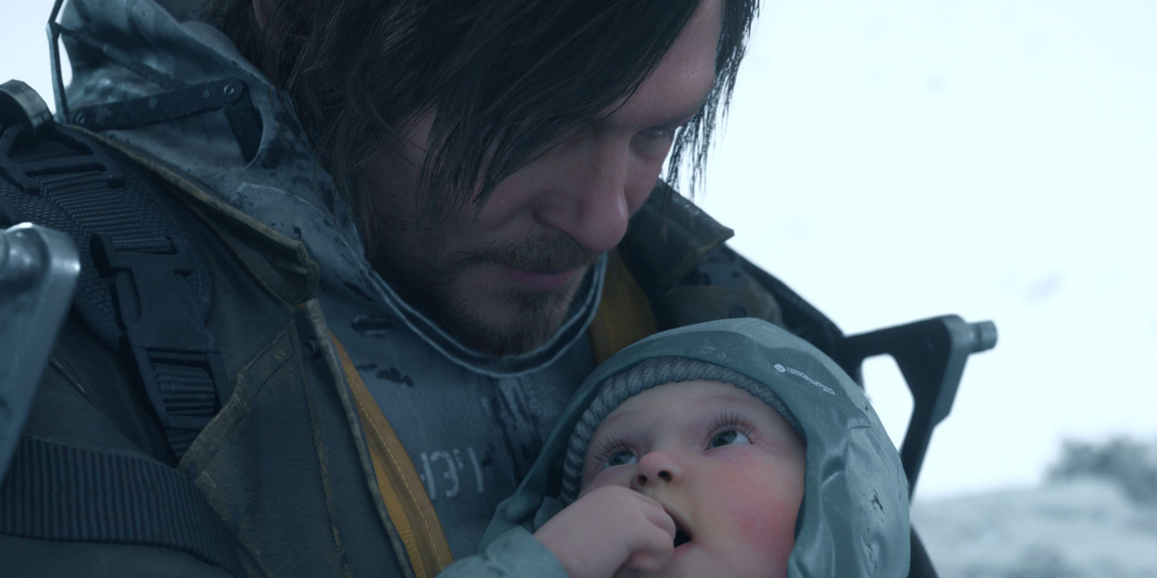 sam looking down at bb in death stranding 2.
