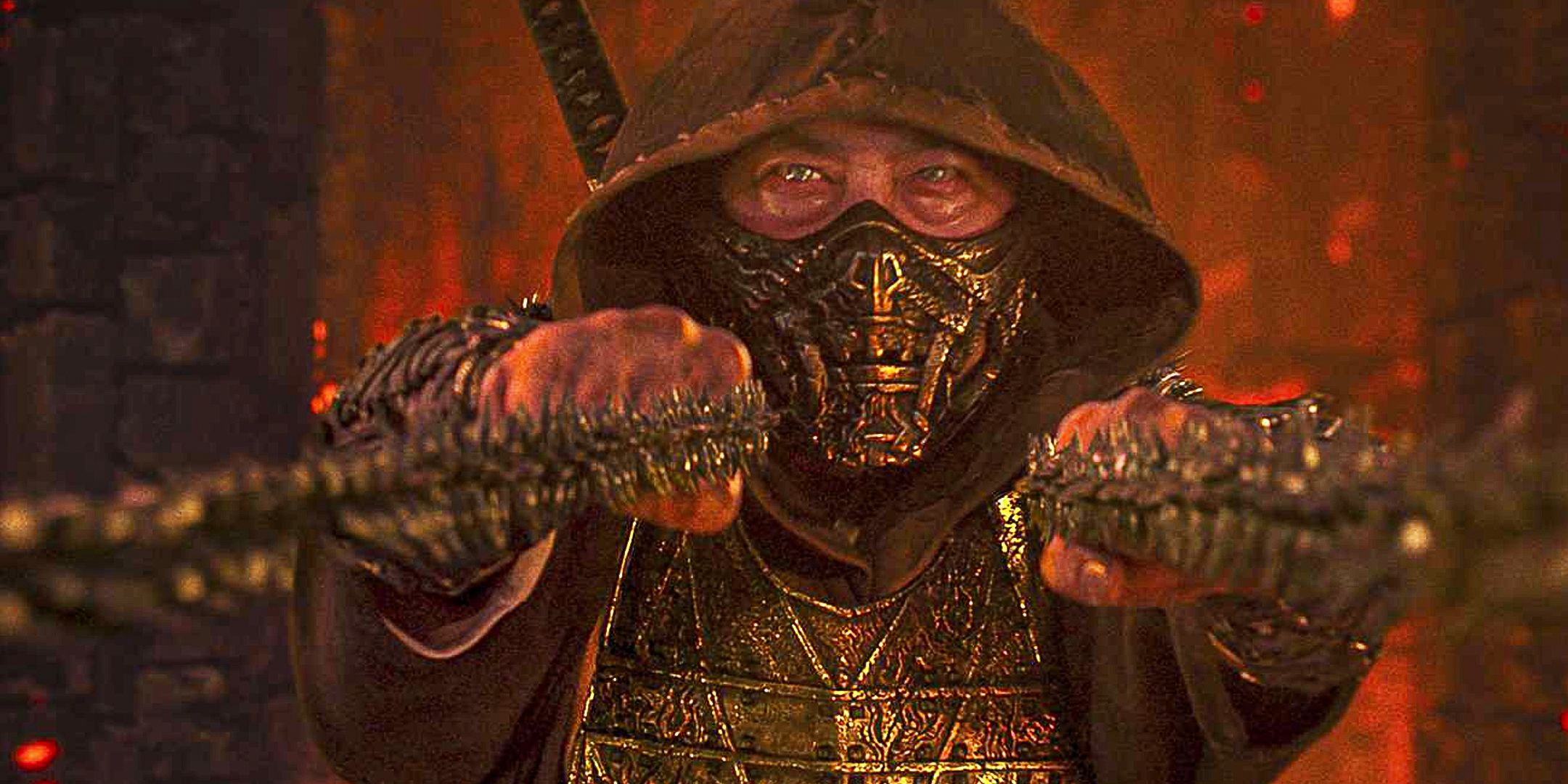 Mortal Kombat Scorpion pulling back his chain in the reboot movie.