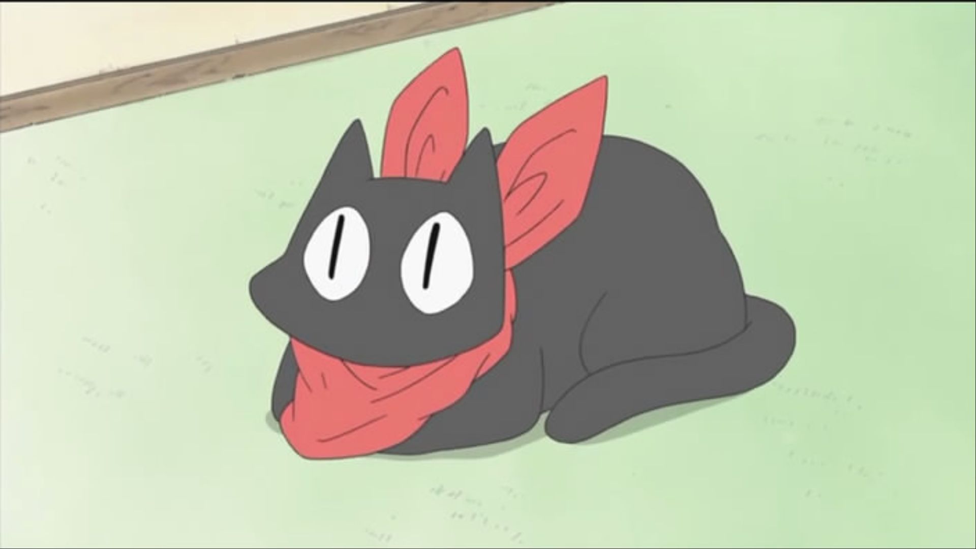 Sakamoto laying on the floor with his legs tucked in Nichijou.