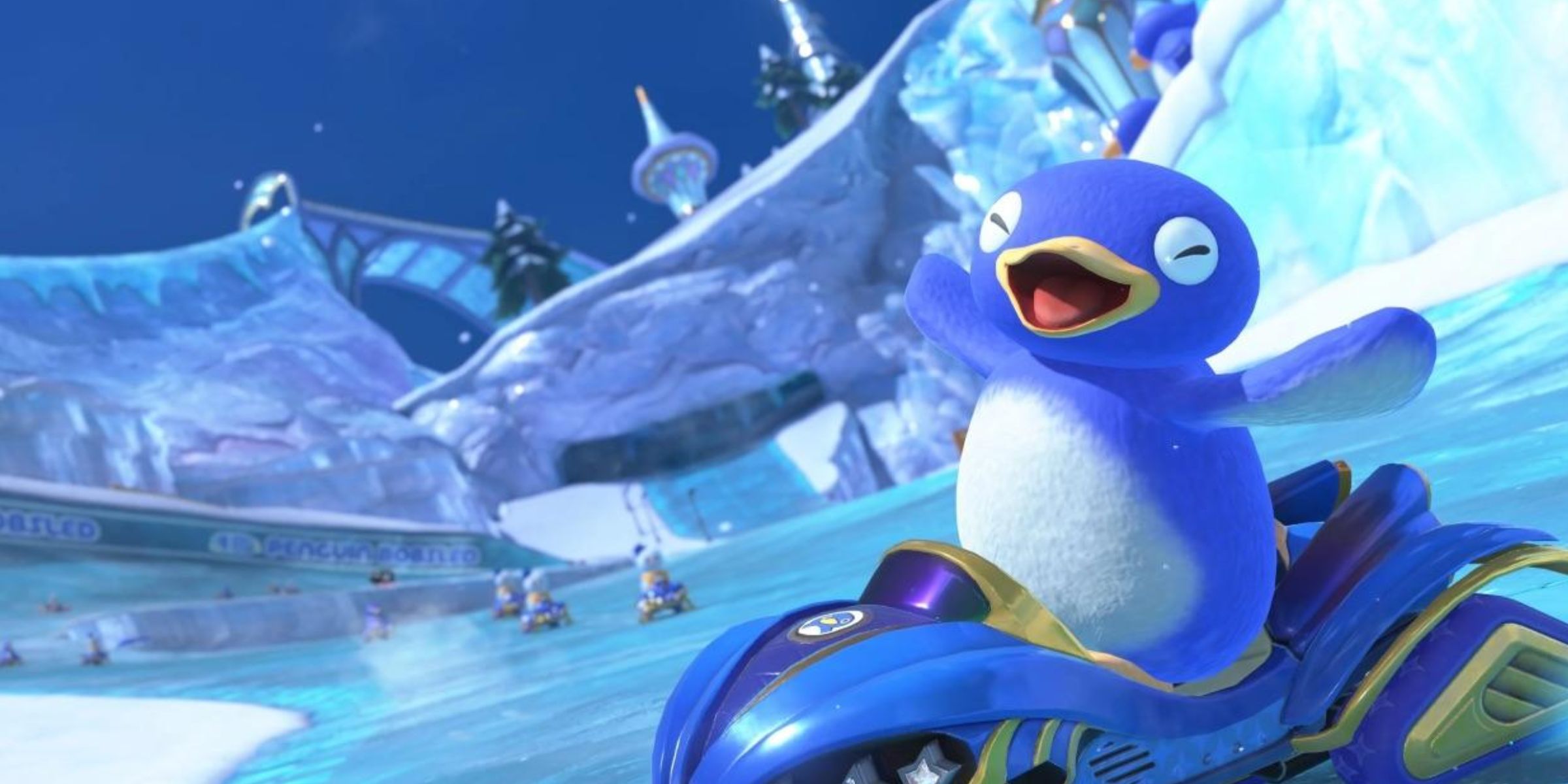 Pengiun racing down the icy Starview Peak in Mario Kart World.