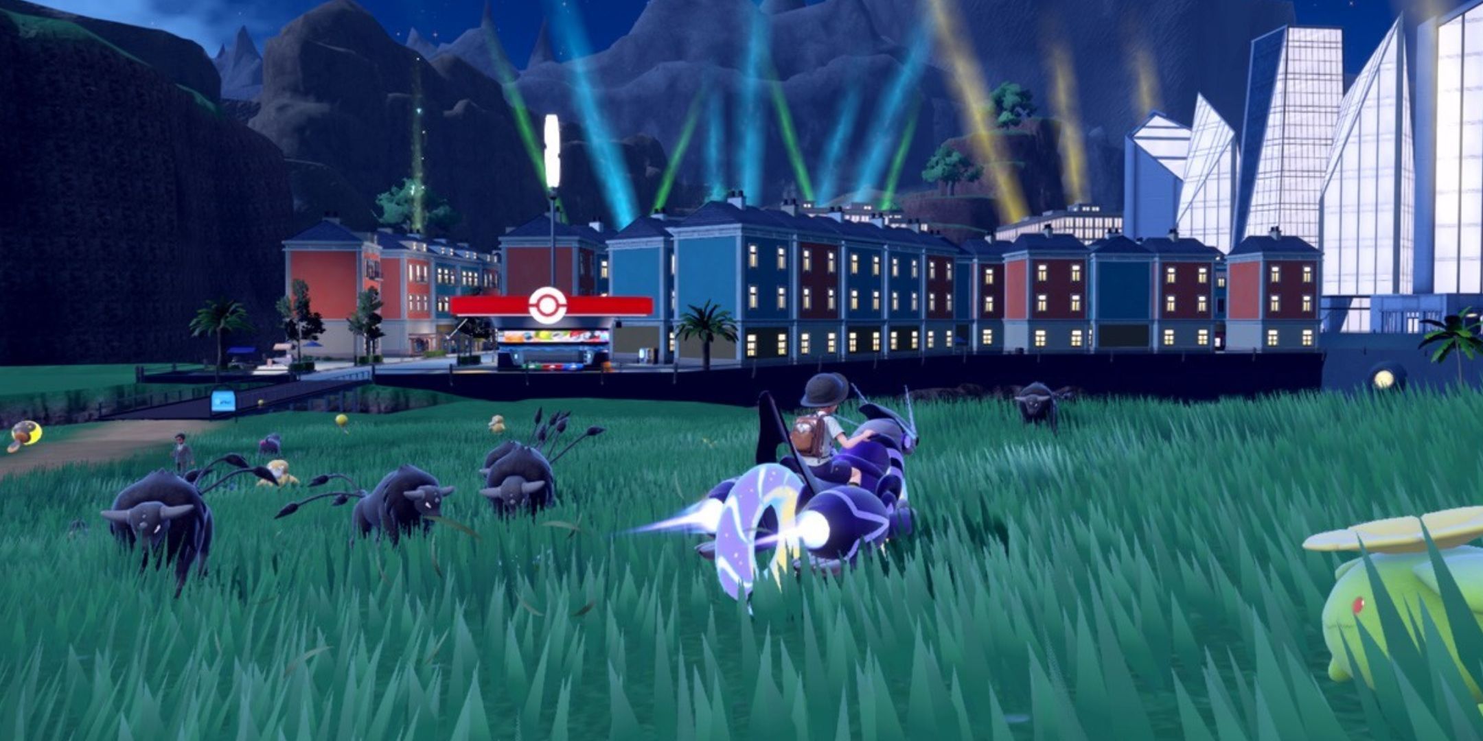 A boy sitting on Miraidon observing a lit-up city in Pokémon Violet.