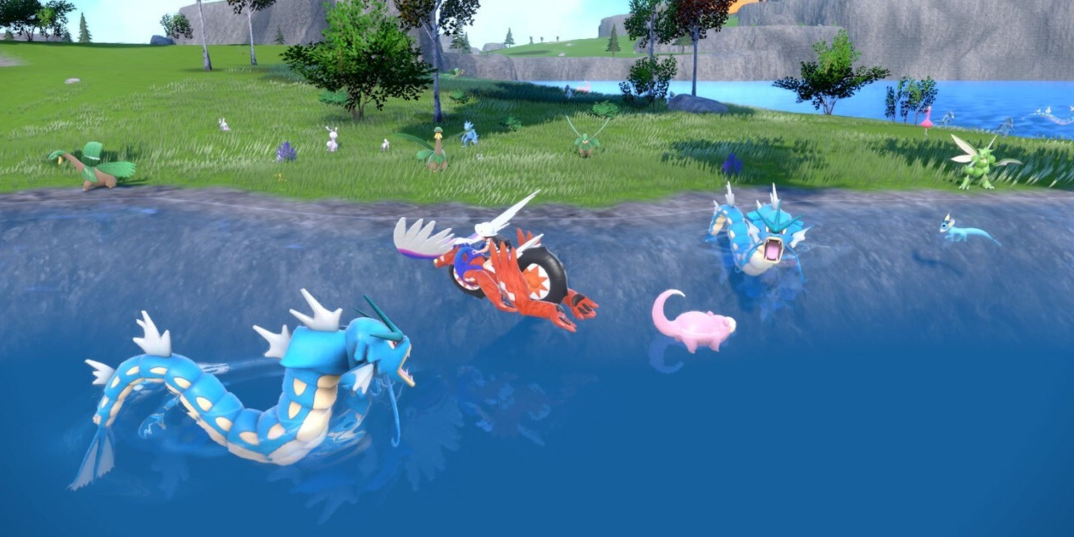 A gyrados and slowpoke in a lake in Pokemon Scarlet and Violet on the Switch 2.