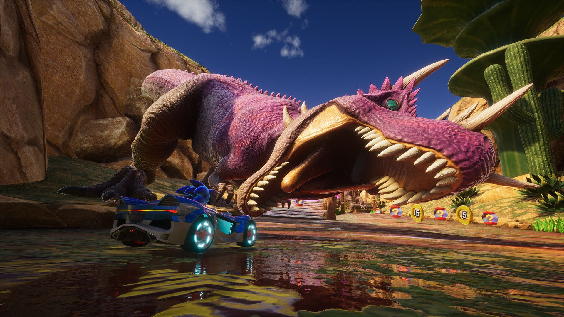 A giant dinosaur tries to eat the player's car in Sonic Racing: CrossWorlds. 