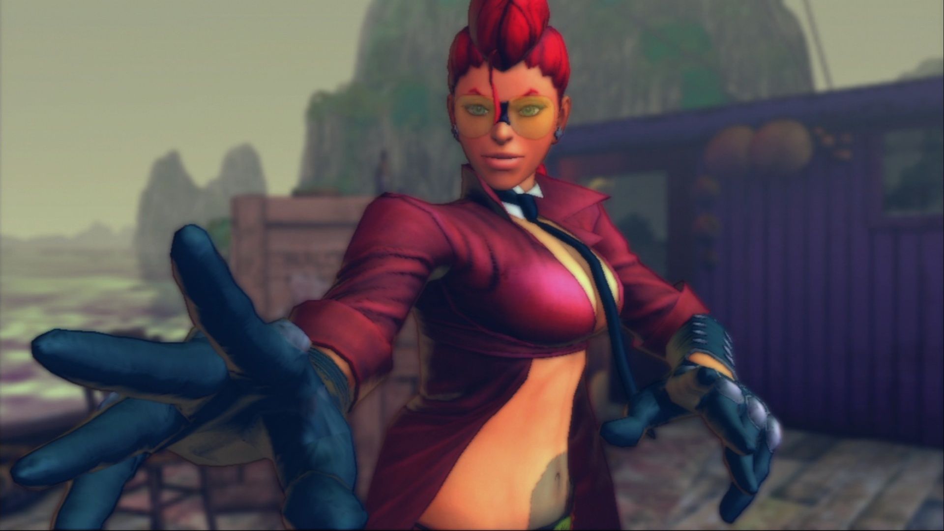 Crimson Viper reaching her hand out in Street Fighter IV.