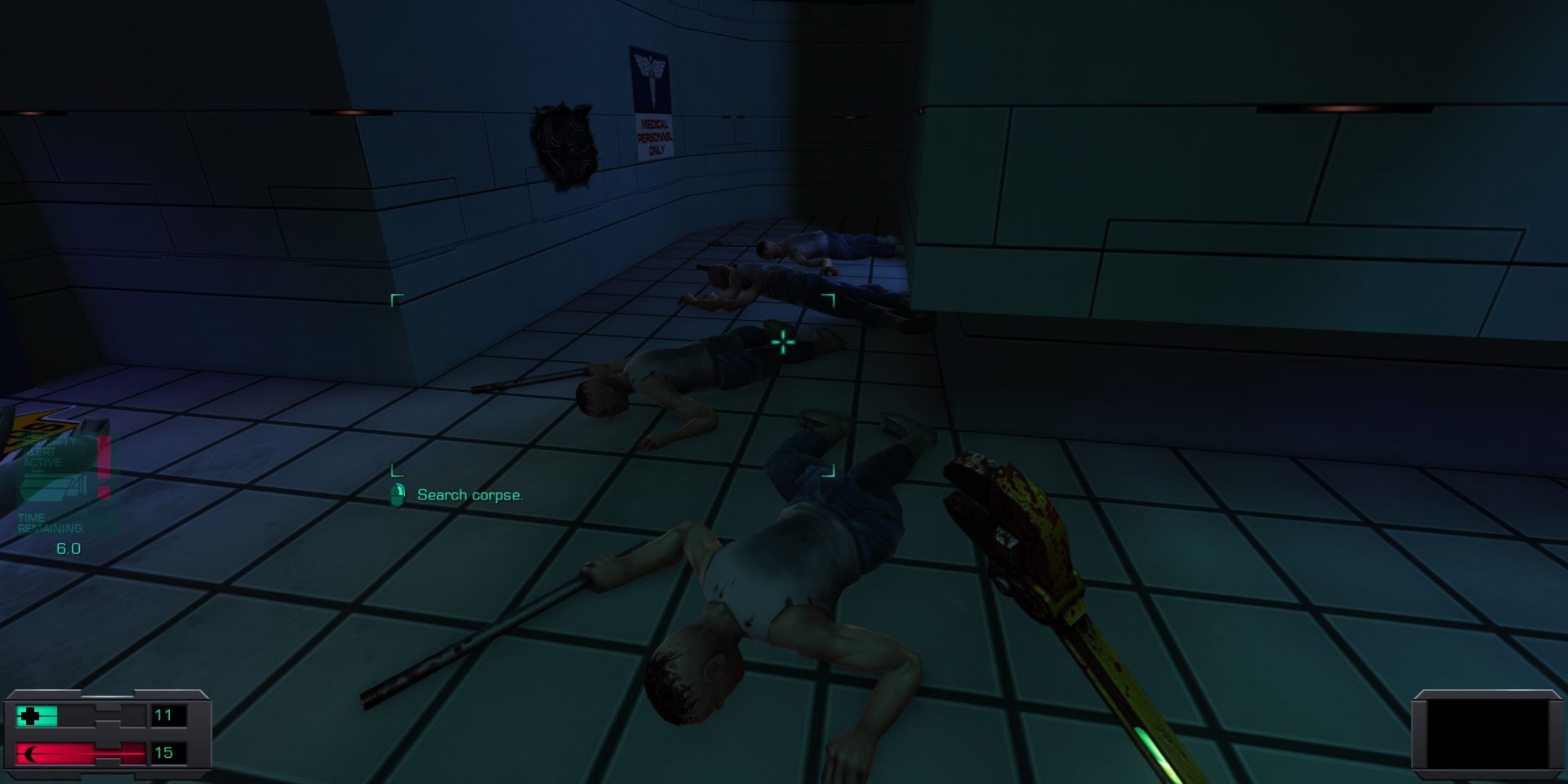 A line of dead hybrids in System Shock 2 Remastered.