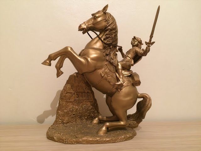 The golden Link and Epona statue from Club Nintendo.