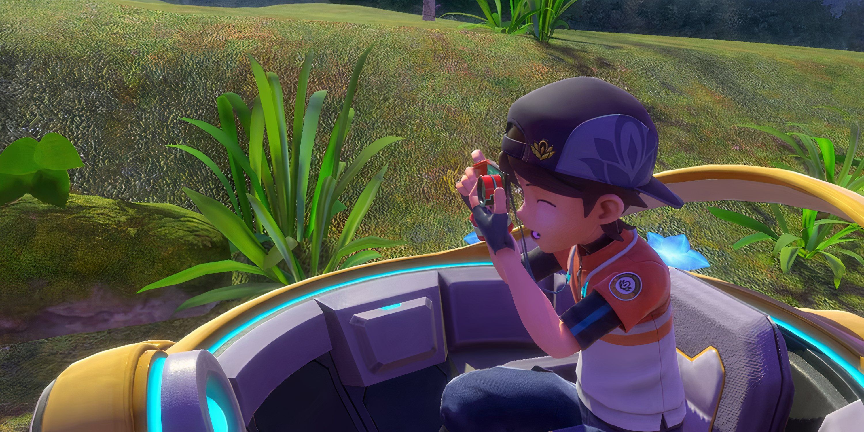 A photographer from New Pokemon Snap takes photos near a grassy hill.