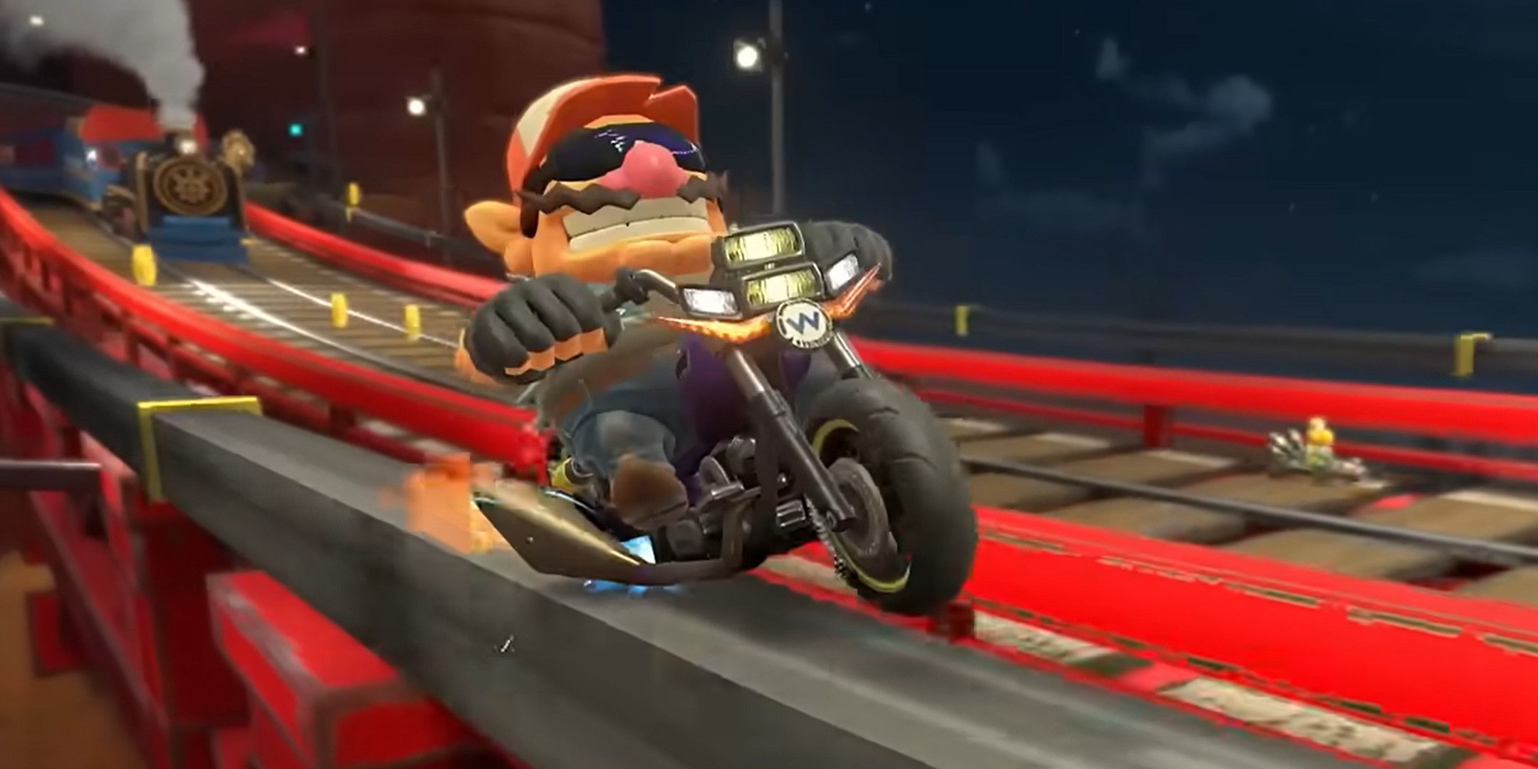 Wario on a bike grinding on a rail.