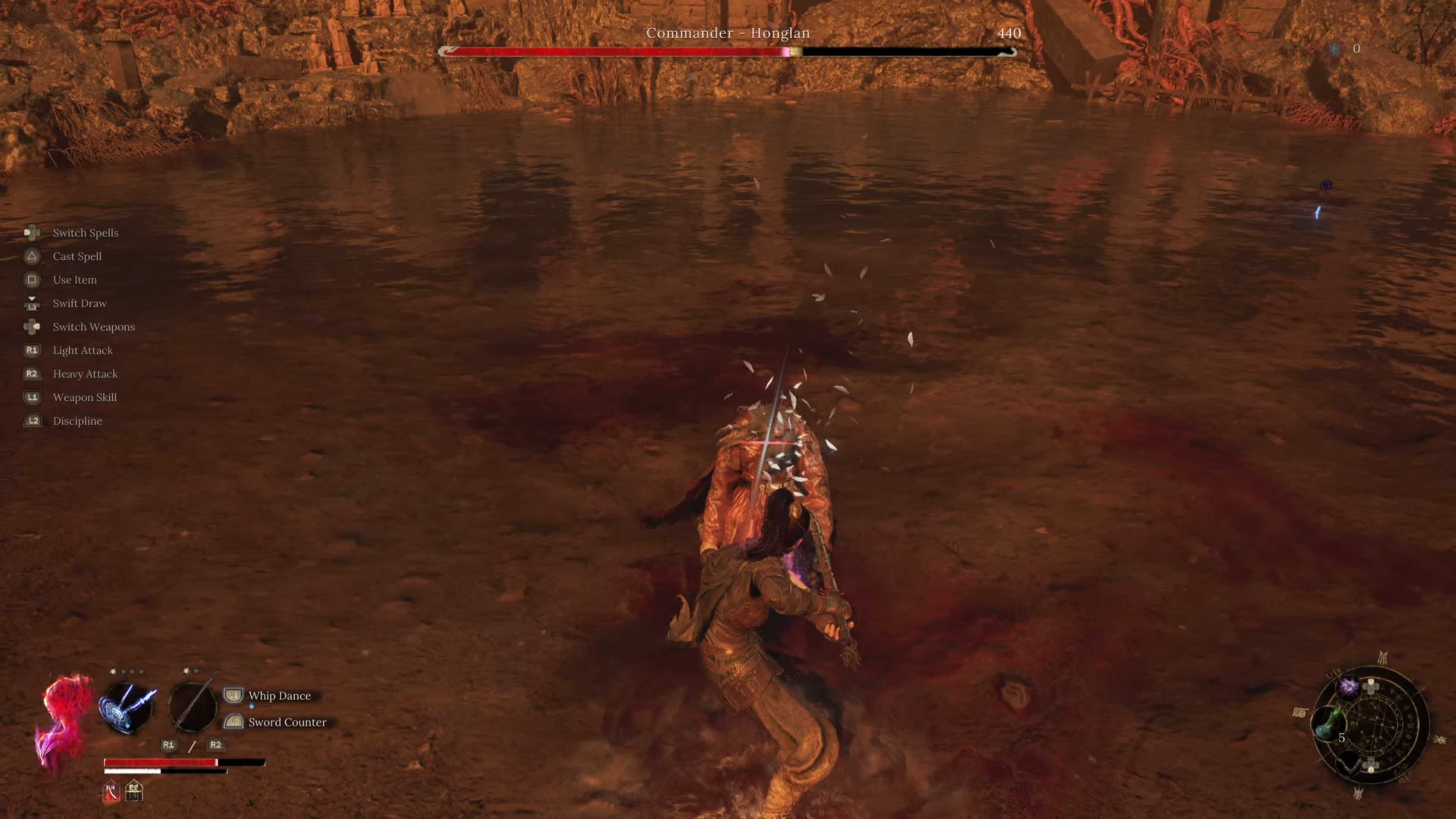 A woman stabbing another woman in the stomach with a large sword.