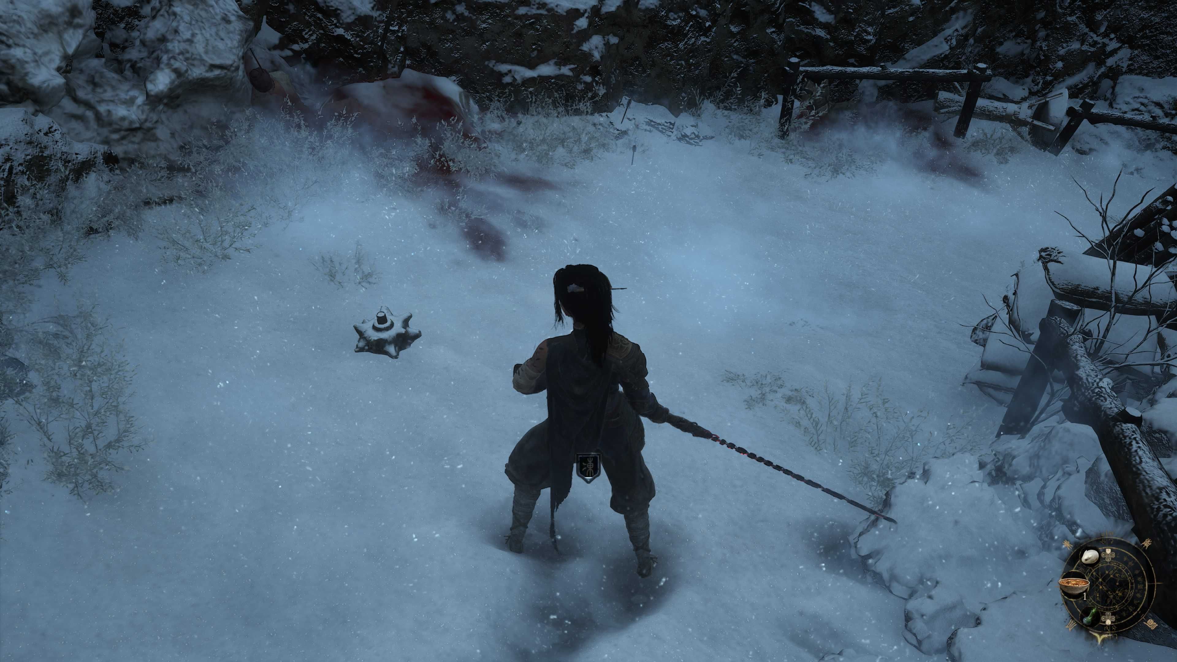 A woman with a sword looking at a mine buried in snow.