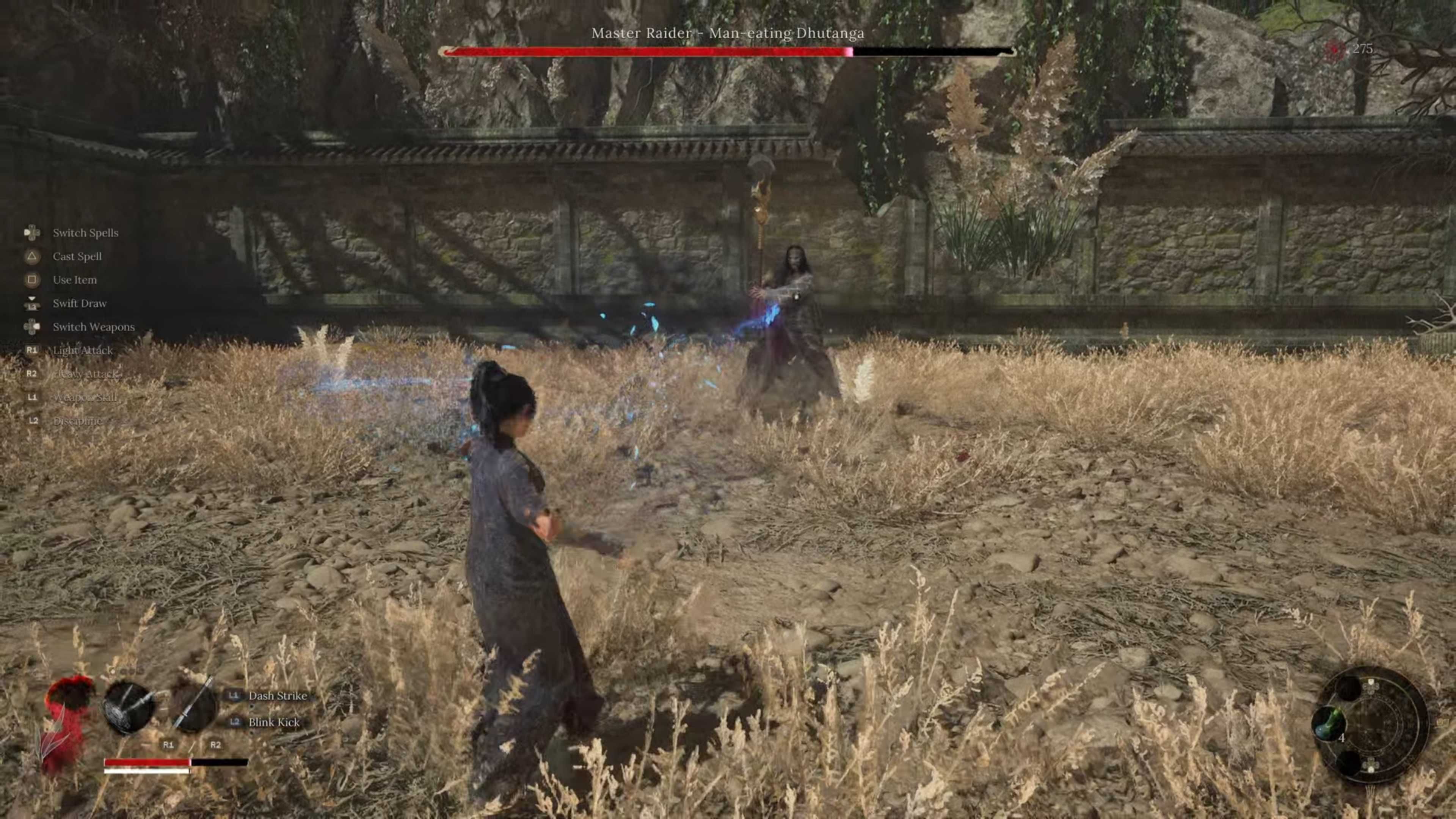 A woman launching spells at a man in the distance.