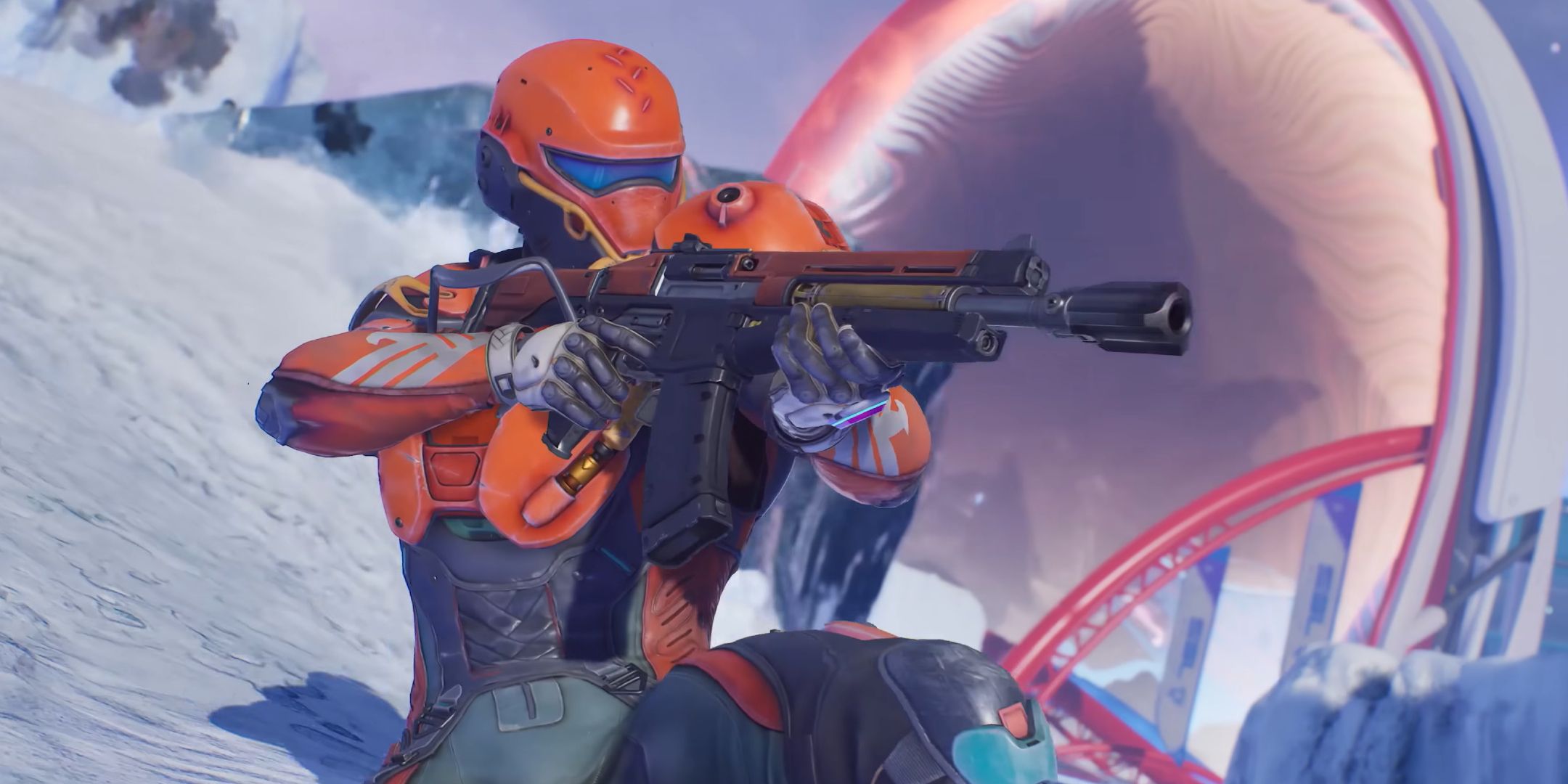 A person in orange armor sliding down a snowy hill while firing a gun.