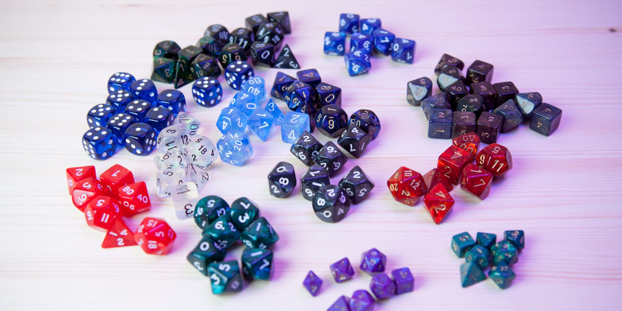 A pile of different colored Chessex Dice.