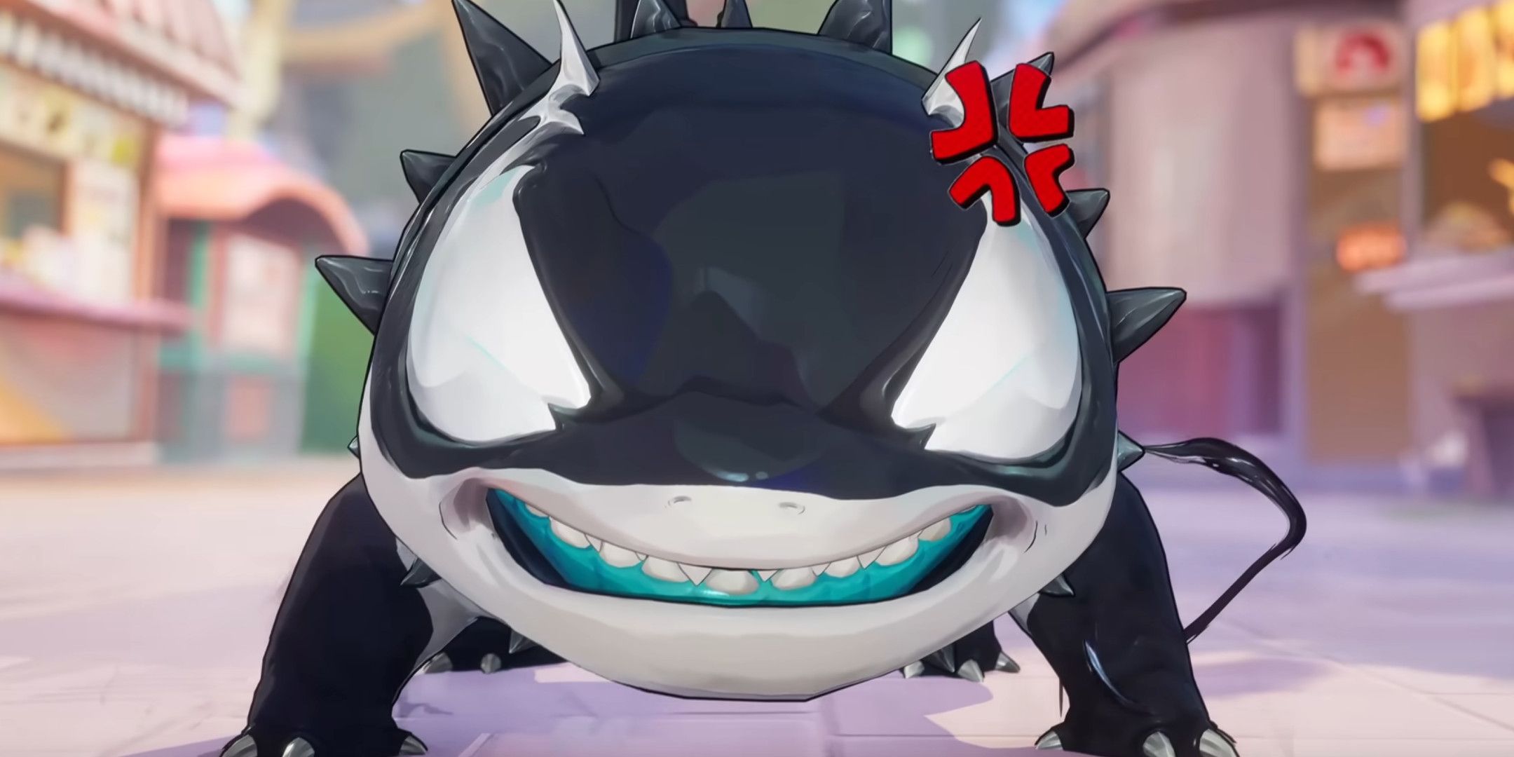 A small black shark with an angry face.