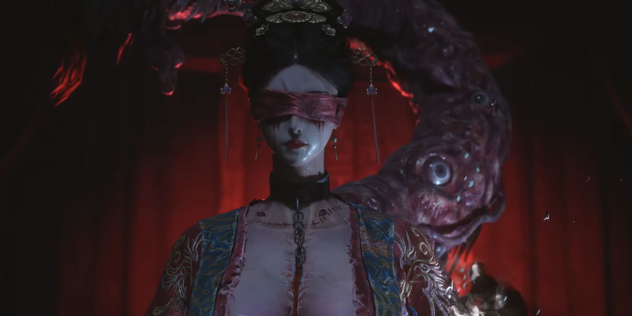 A woman wearing a blindfold with a large tentacle coming out her back.