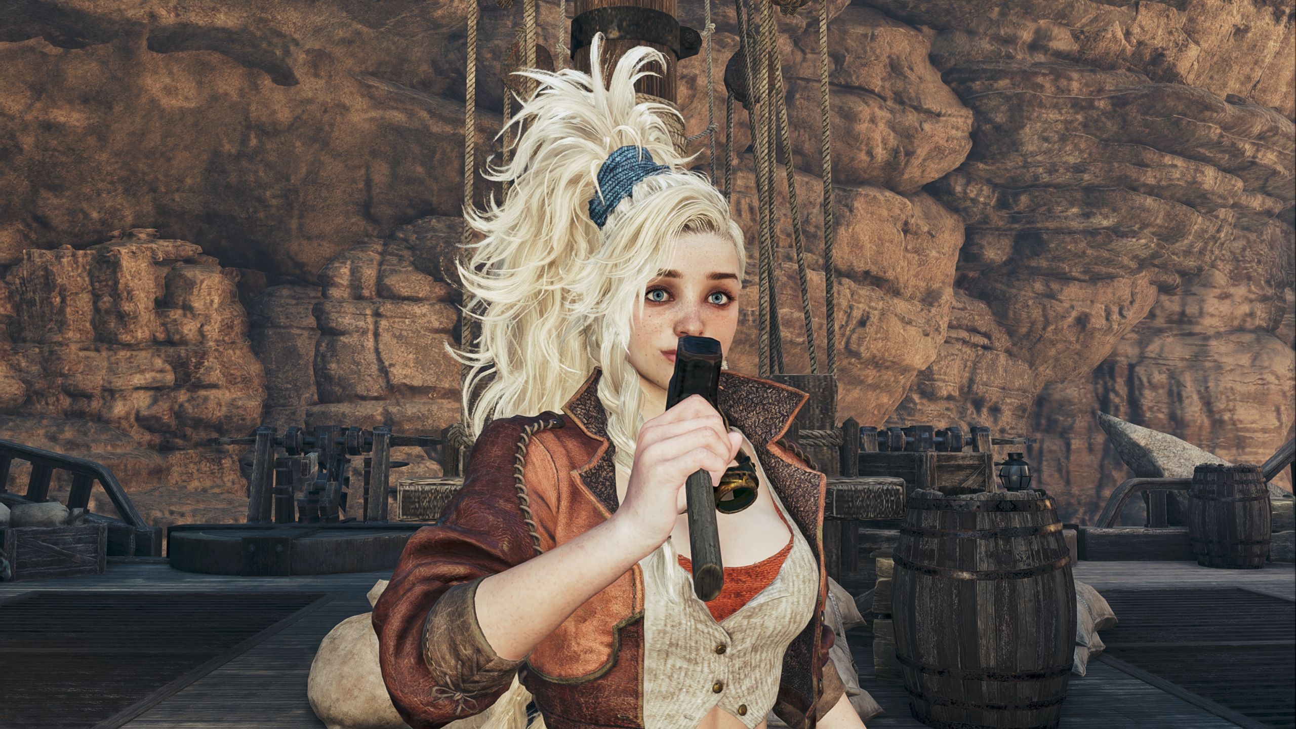 Gemma hosting an event while holding a hammer like a microphone in Monster Hunter Wilds.