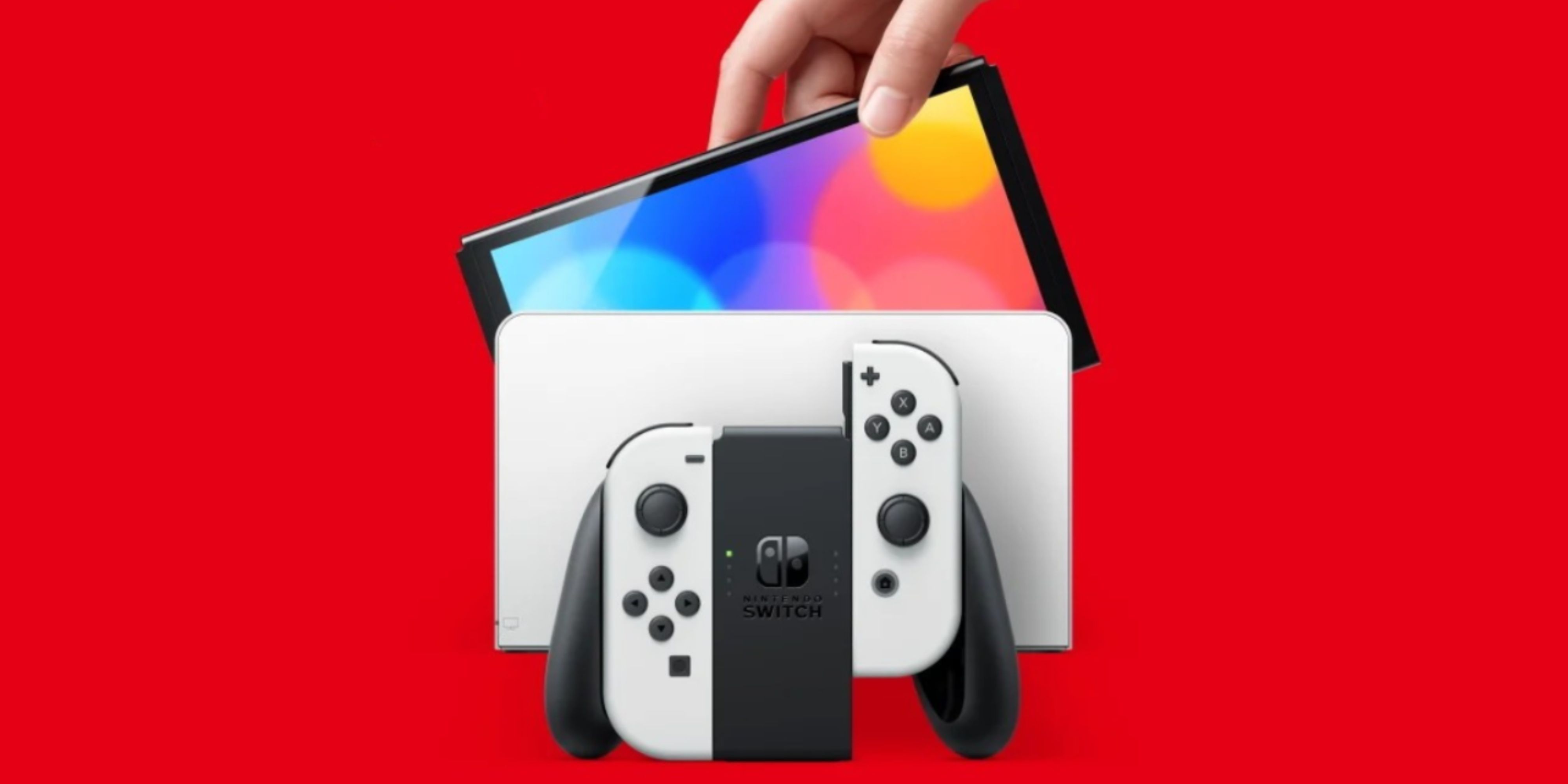someone lifting the screen out of an oled switch dock.