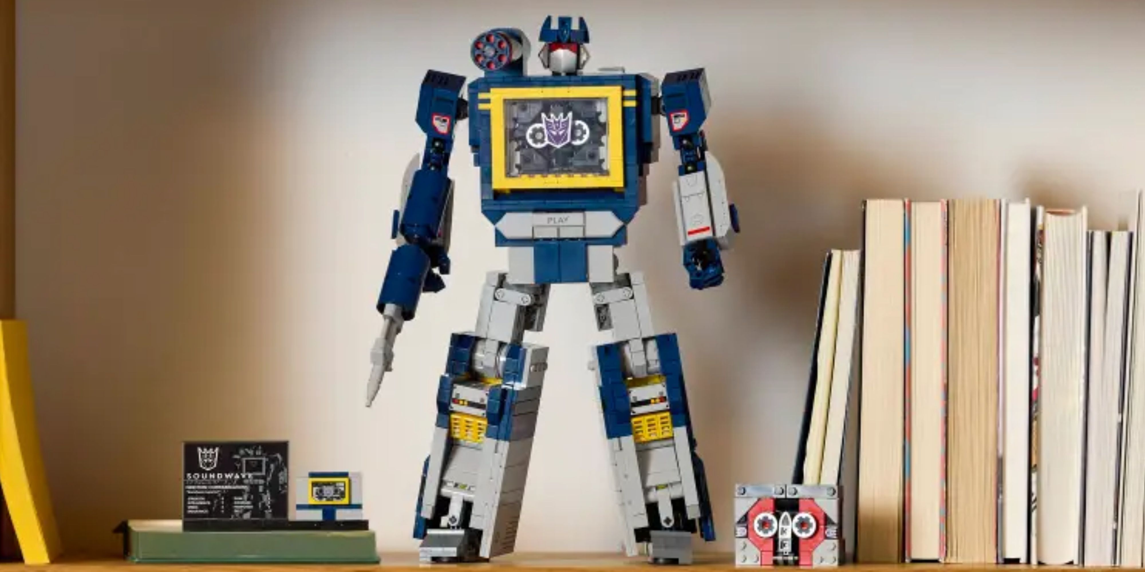 lego transformers soundwave set standing on a shelf.