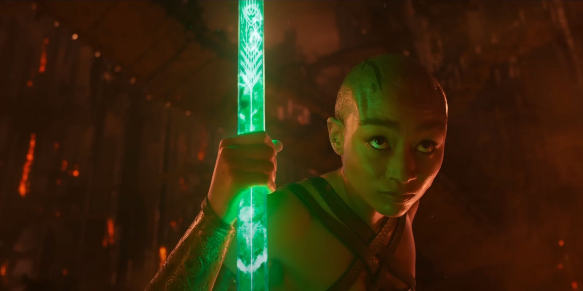 Jade from Mortal Kombat 2 holding a green glowing bo staff.