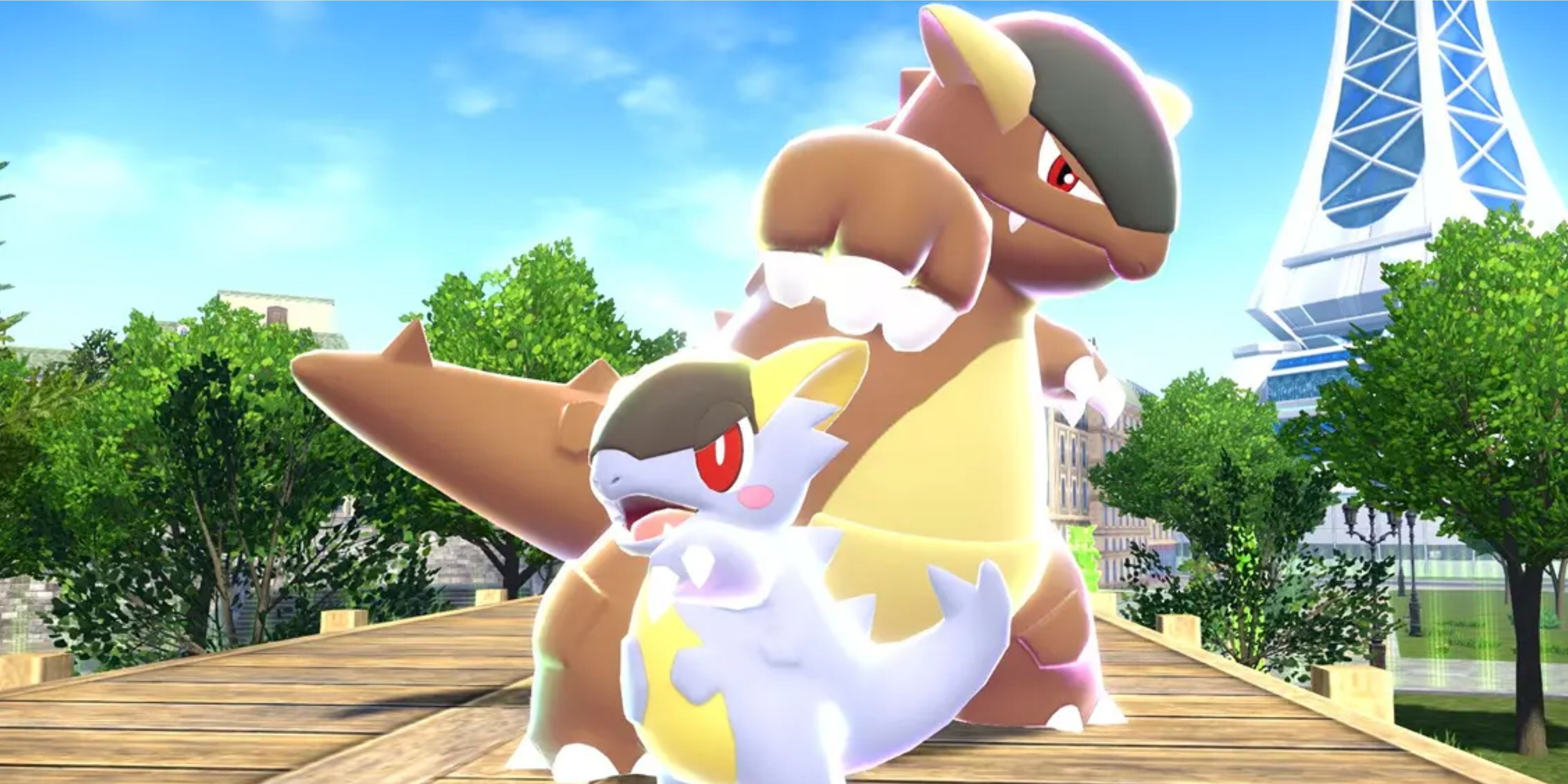 kangaskhan with its baby standing in front of it.