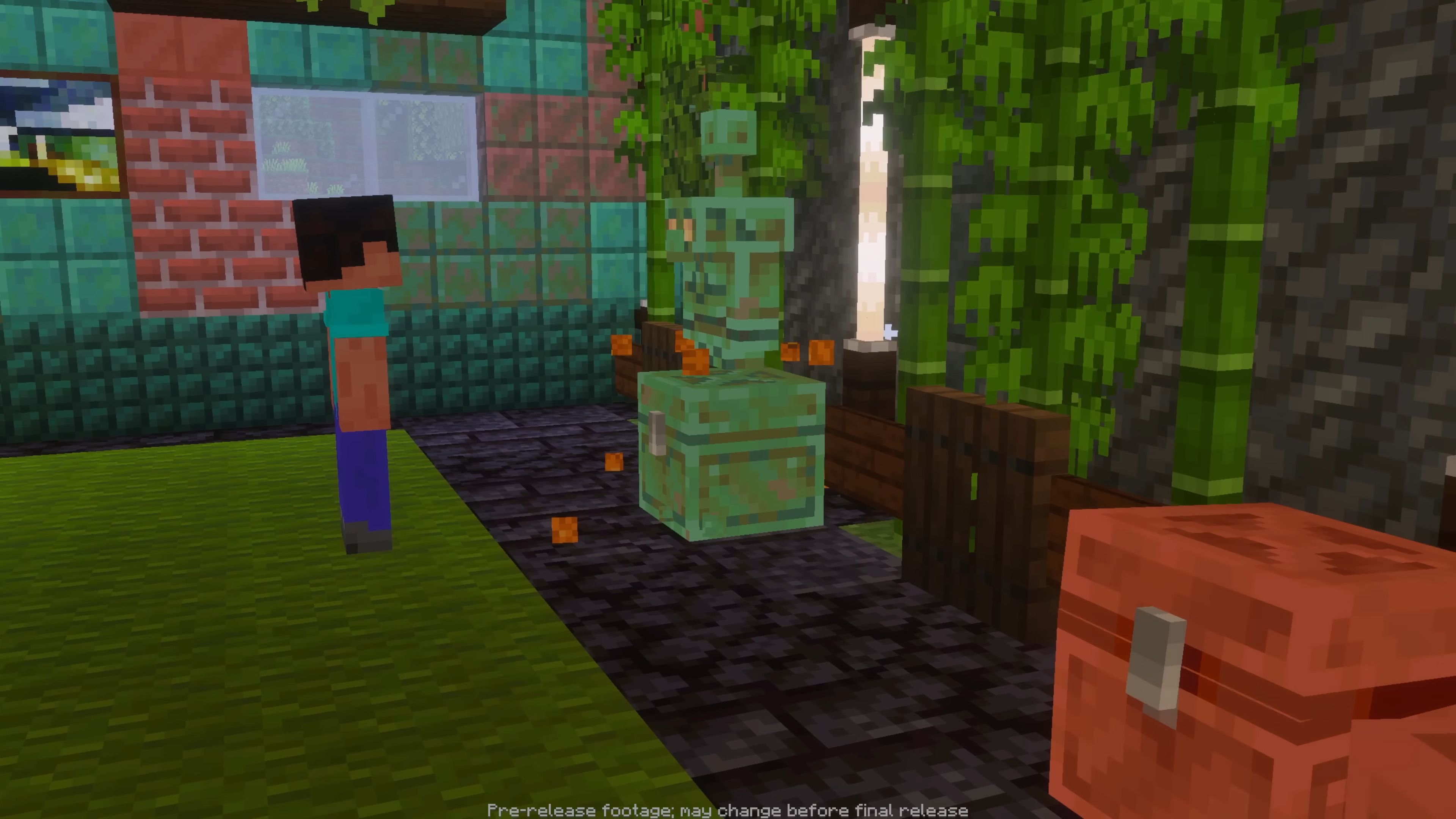 Minecraft player looking at an oxidised copper golem sitting on an oxidised copper chest.
