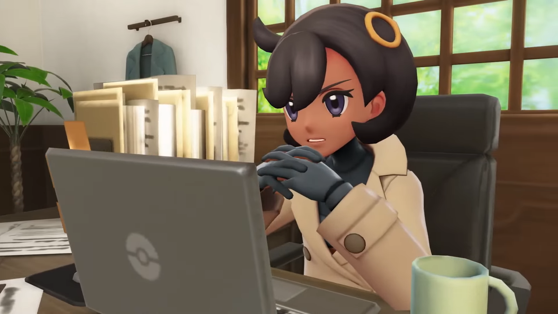 Detective looking at her laptop in Pokemon Legends Z-A.