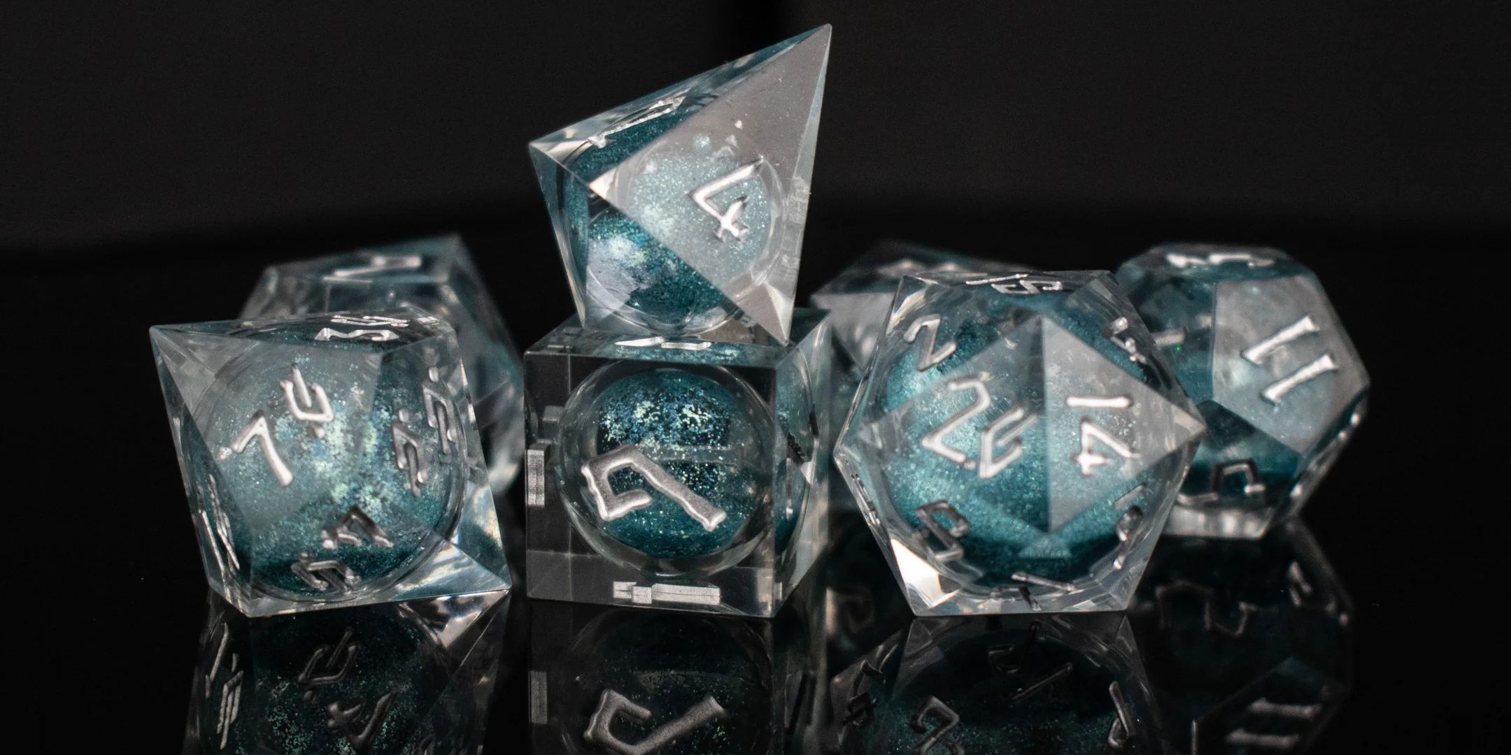 Promotional Image of a the Silent Waters Liquid Core dice set by Misty Mountain Gaming.