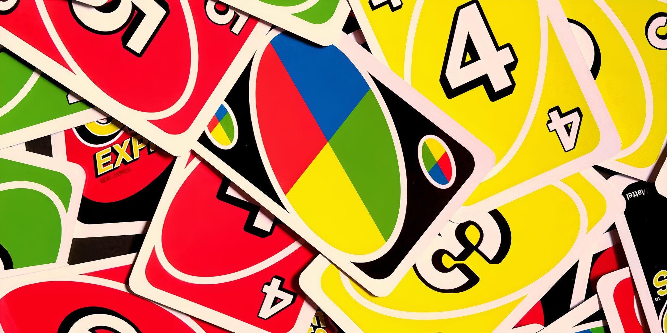A jumbled deck of Uno cards.