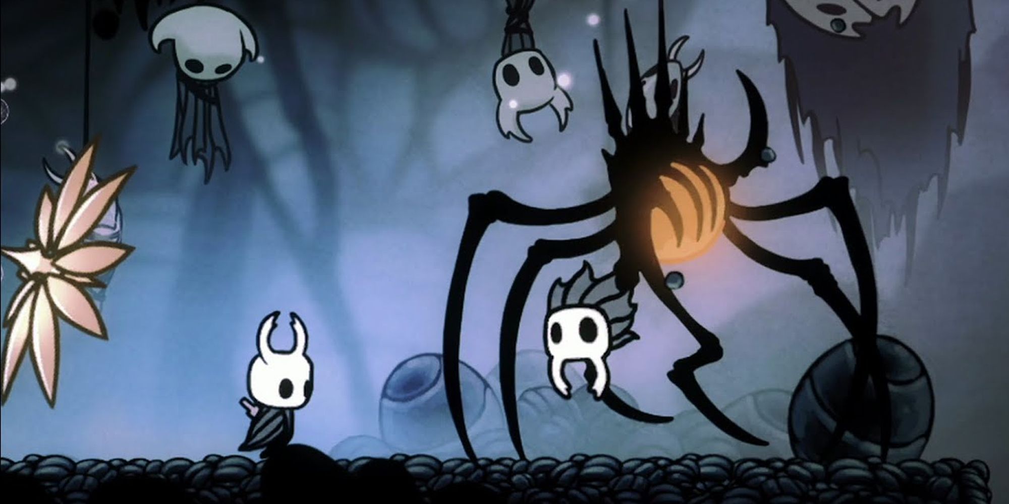 The Knight meets Nosk in Hollow Knight.