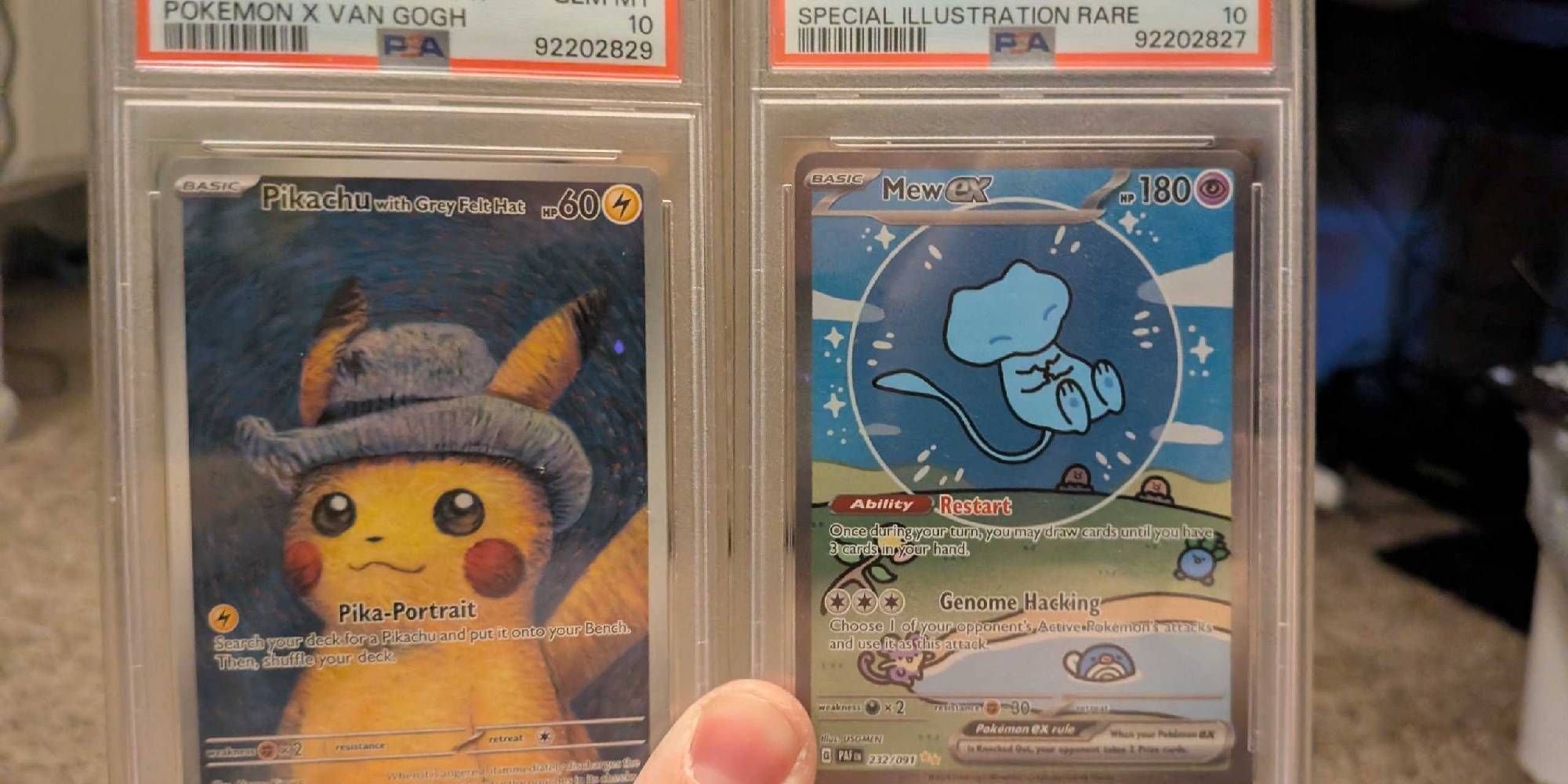 Two PSA10 Pokemon Cards.