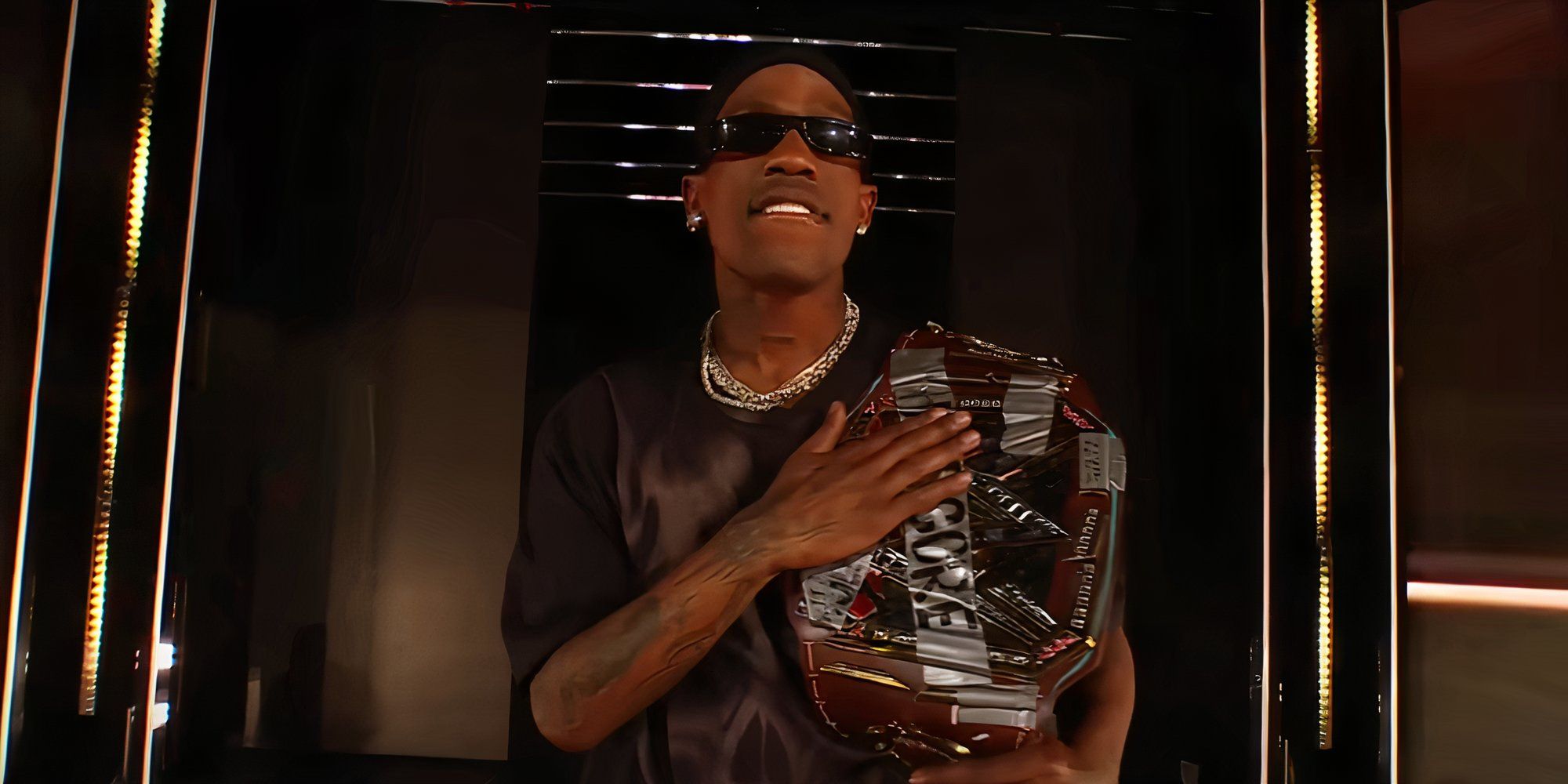 Travis Scott making his entrance at this year's WrestleMania PPV.