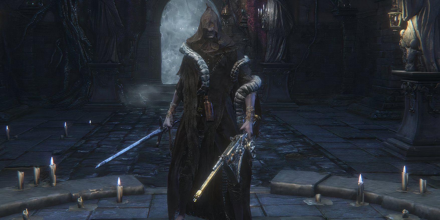 The player wearing robes and coils, holding strange weapons in a dungeon of Bloodborne.