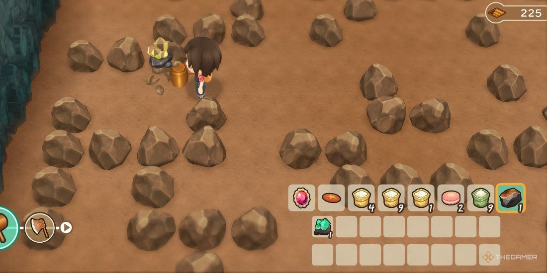 Protagonist collects ore in the rock mine in SoS: Friends of Mineral Town