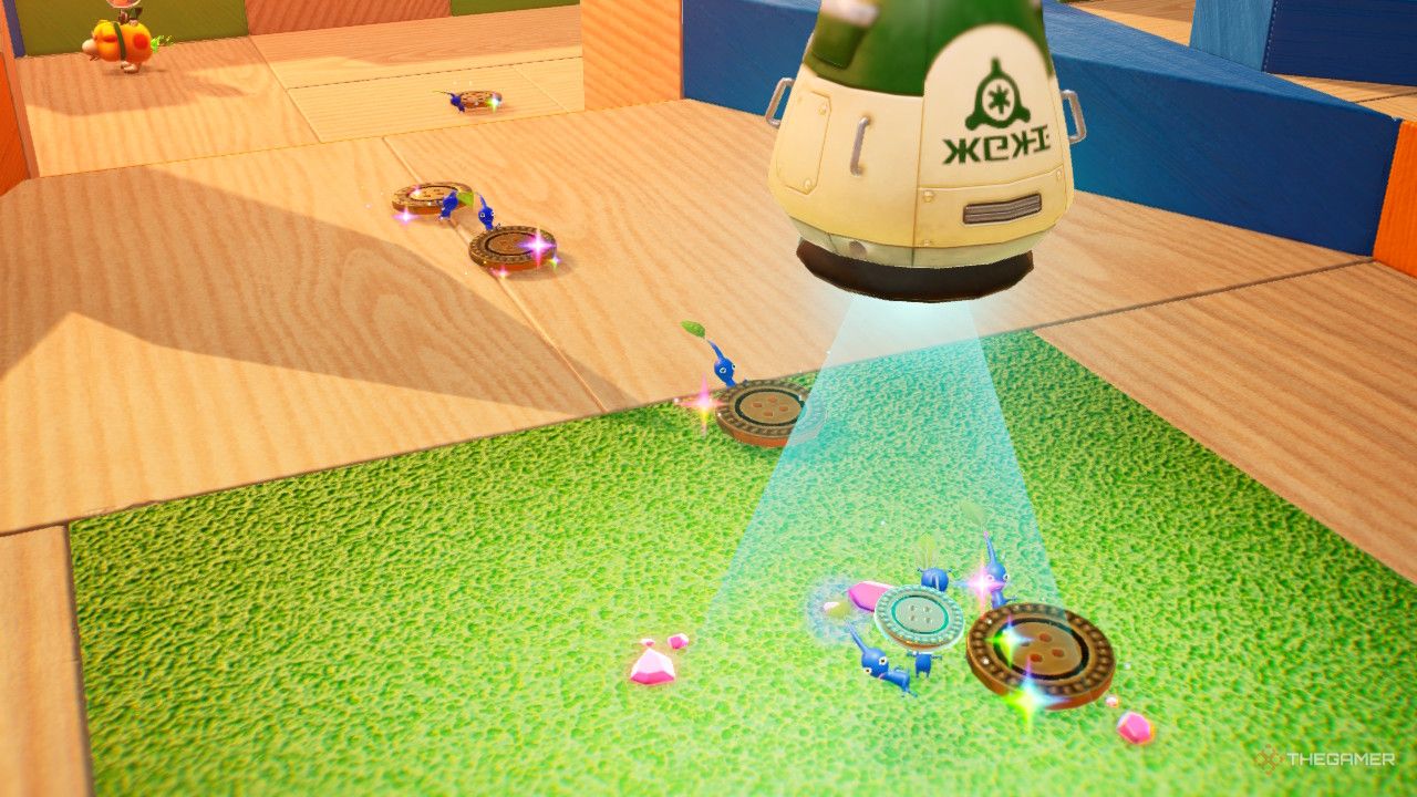 a line of buttons carried to the ship  treasure in Pikmin 4
