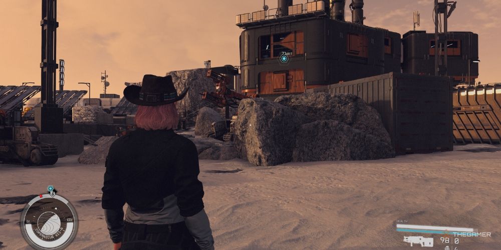 standing in front of the outpost where the gang leader is located in Starfield