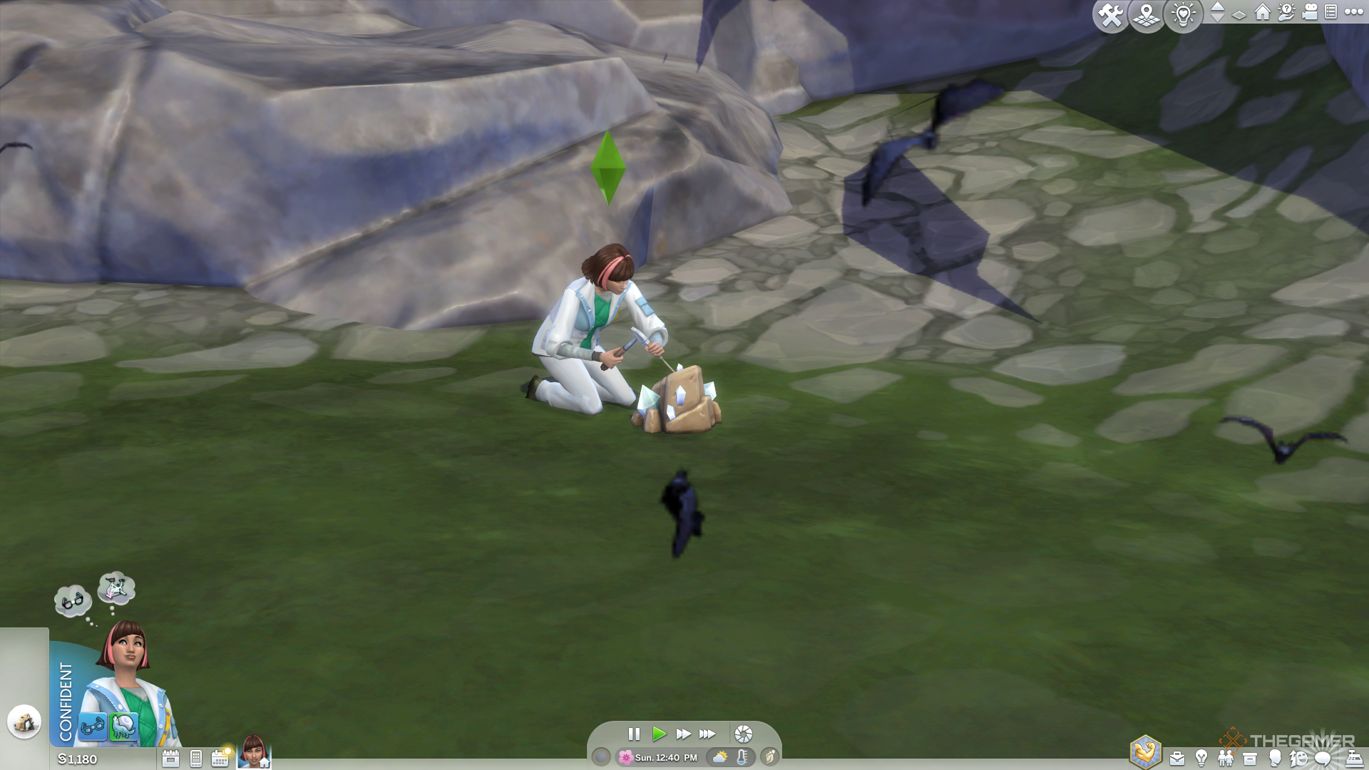 Mining a rock for metal or crystal.