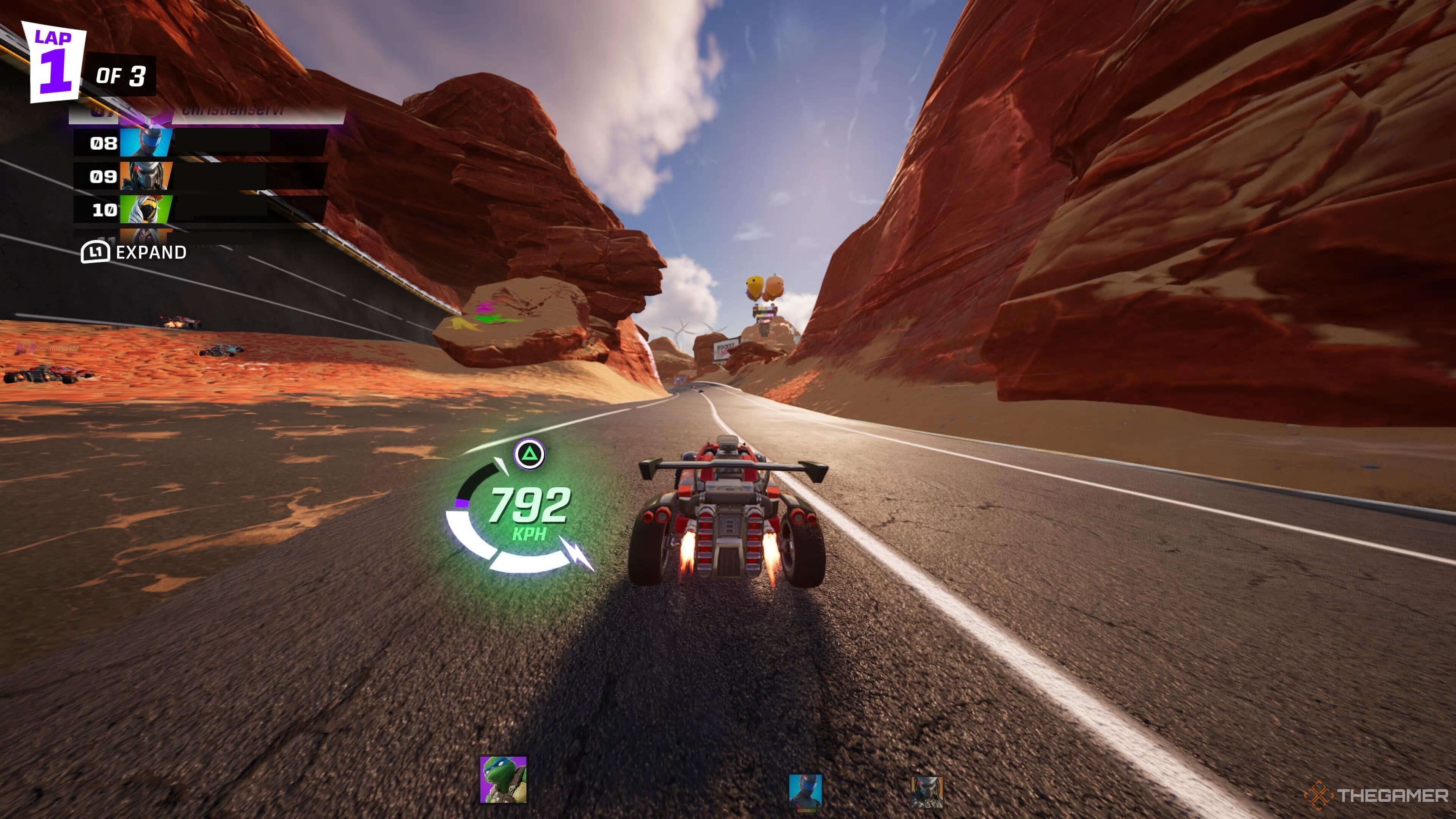 A screenshot from Fortnite Rocket Racing showing the player's car has two full Turbo meters, with a prompt for the PlayStation's Triangle button shown to activate it