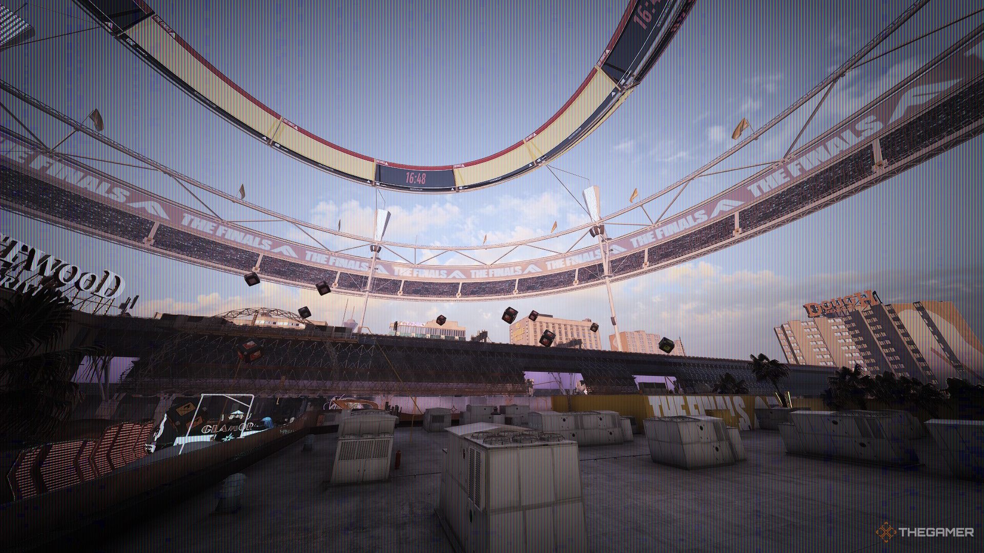 A screenshot from The Finals showing several hanging crates in the distance