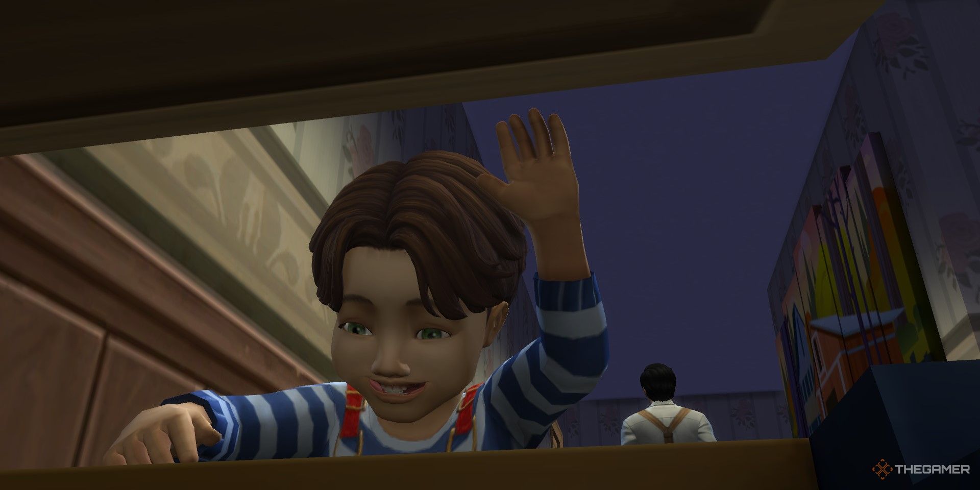 A male toddler sim opens up a toy chest while an adult male walks away in the background.
