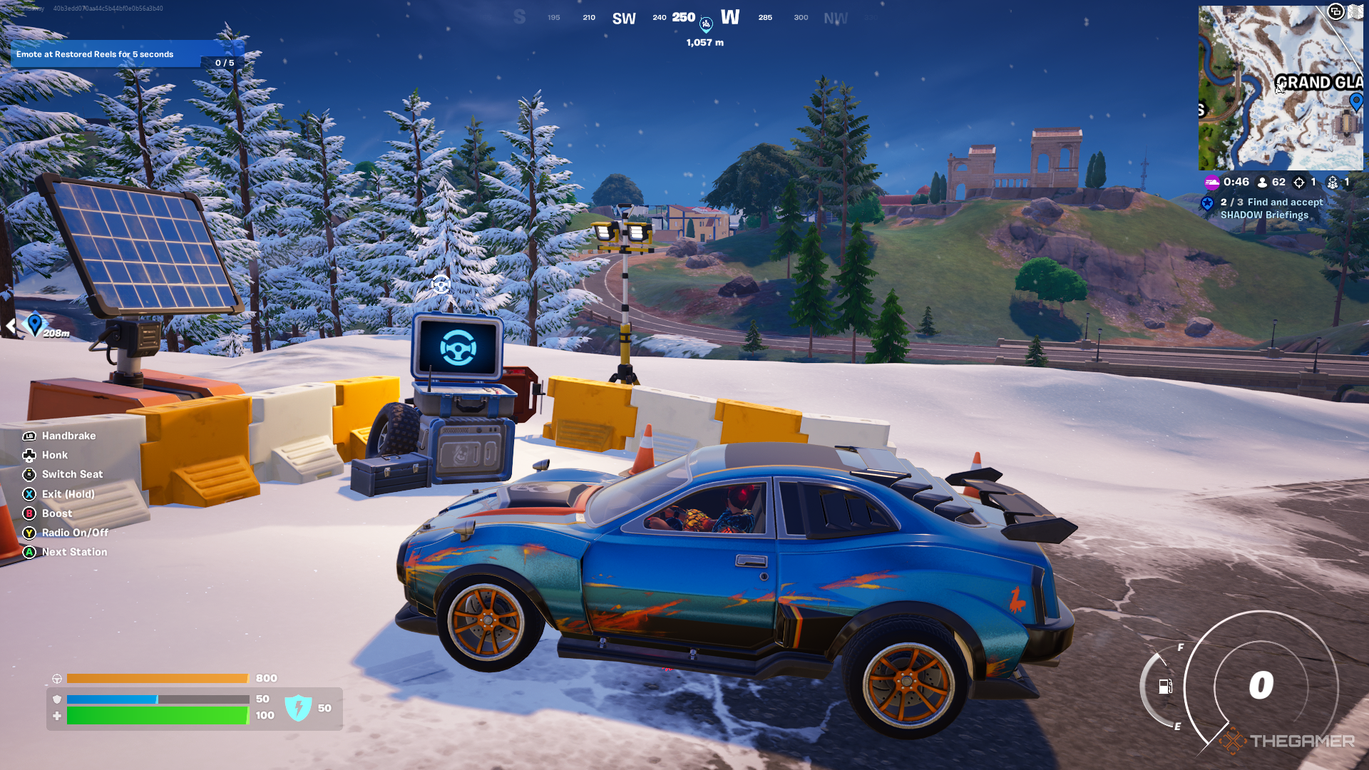 A screenshot from Fortnite showing the player character as Valeria sitting in a blue muscle car. In front of it is a square terminal with a light blue holographic steering wheel on the screen
