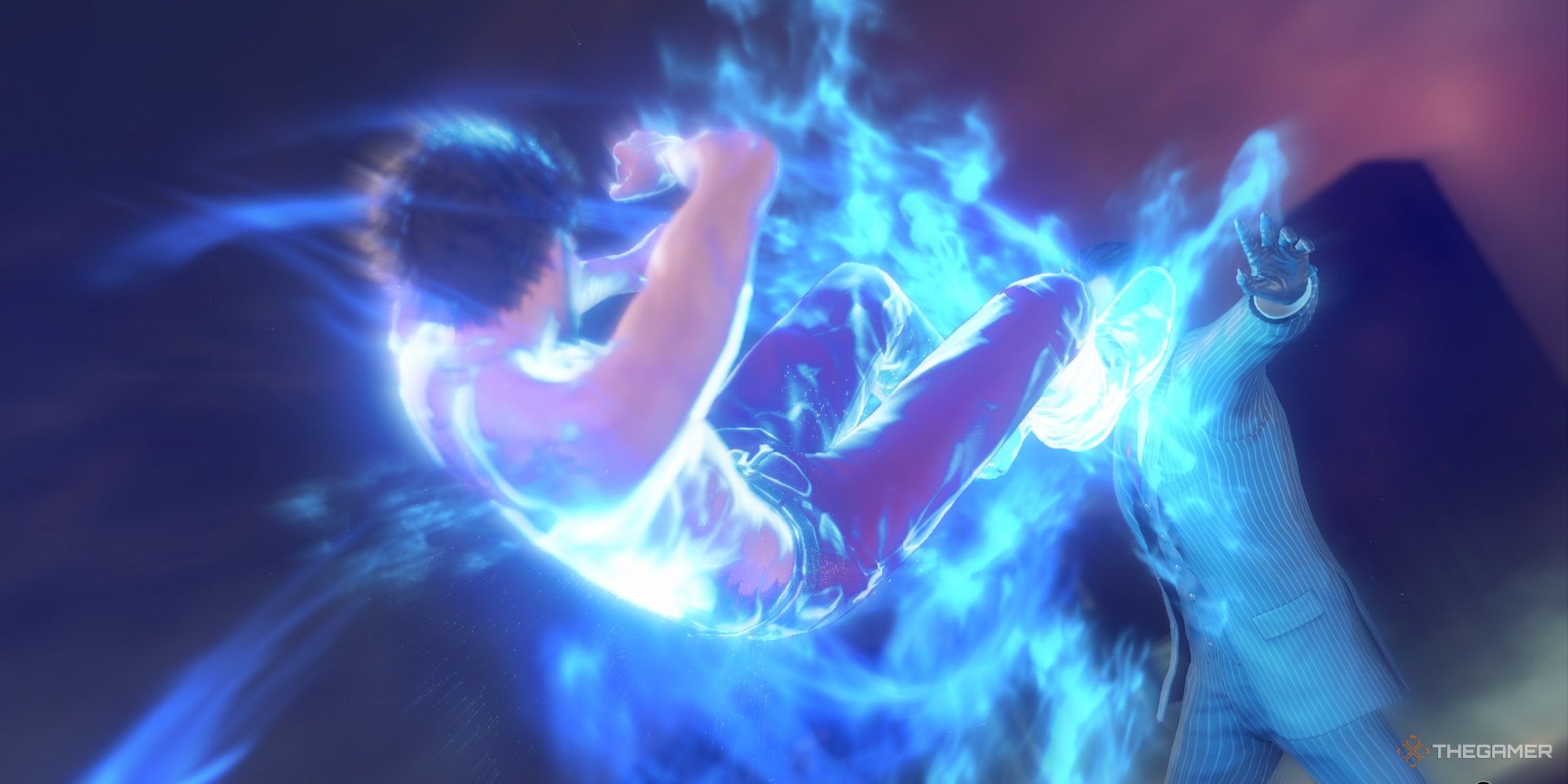 ichiban two-footed kicking an opponent while shrouded in blue fire in yakuza like a dragon